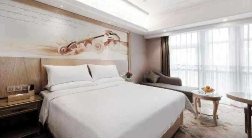 Bed in Vienna Hotel Chongqing Yongchuan High-Speed Railway Station Xinglong Lake