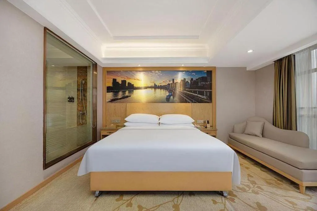 Bed in Vienna Hotel Chongqing Yongchuan High-Speed Railway Station Xinglong Lake