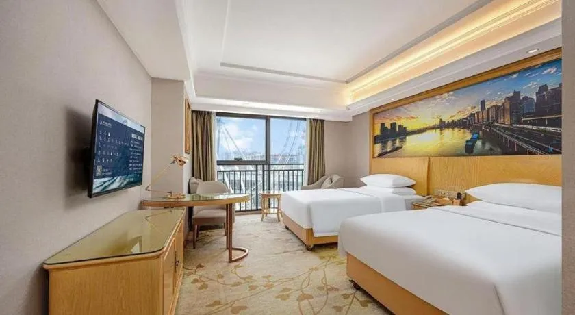 Bed in Vienna Hotel Chongqing Yongchuan High-Speed Railway Station Xinglong Lake