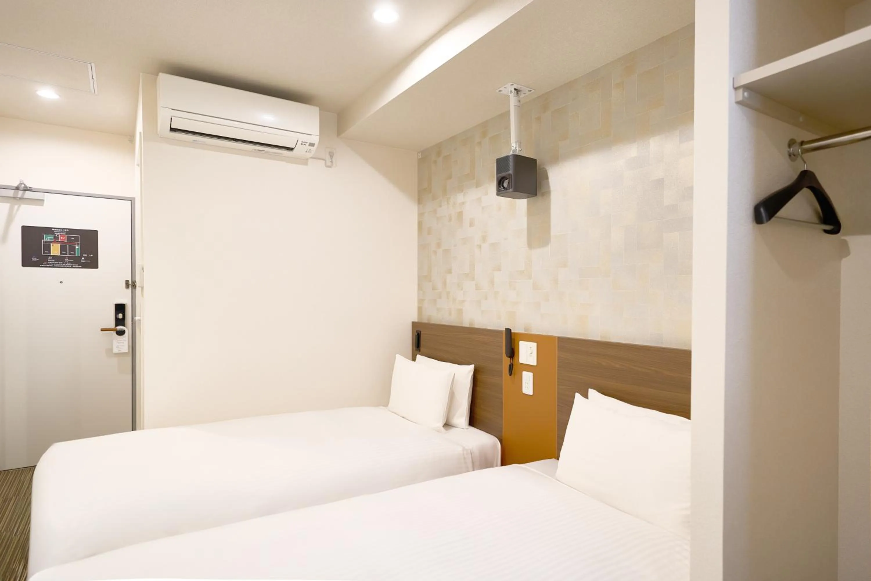 Bed in Nplus HOTEL Tokyo Nihonbashi