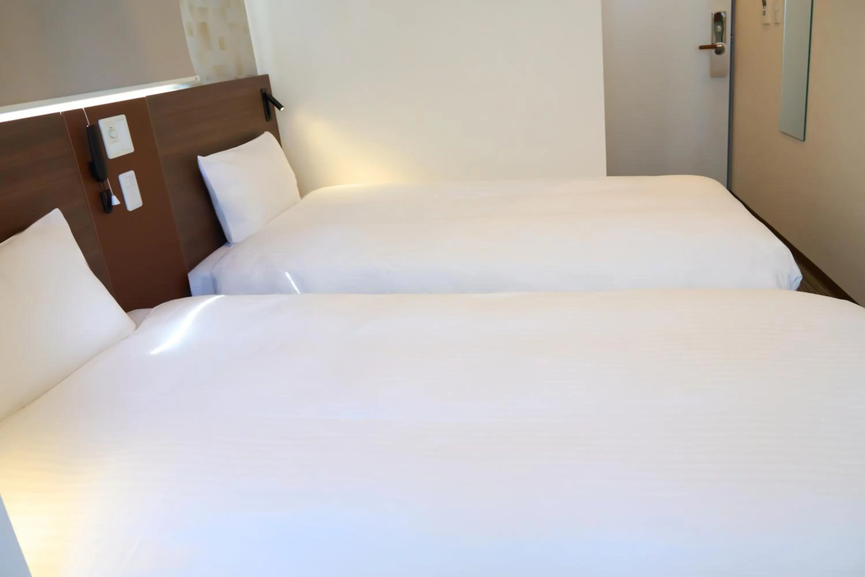 Bed in Nplus HOTEL Tokyo Nihonbashi