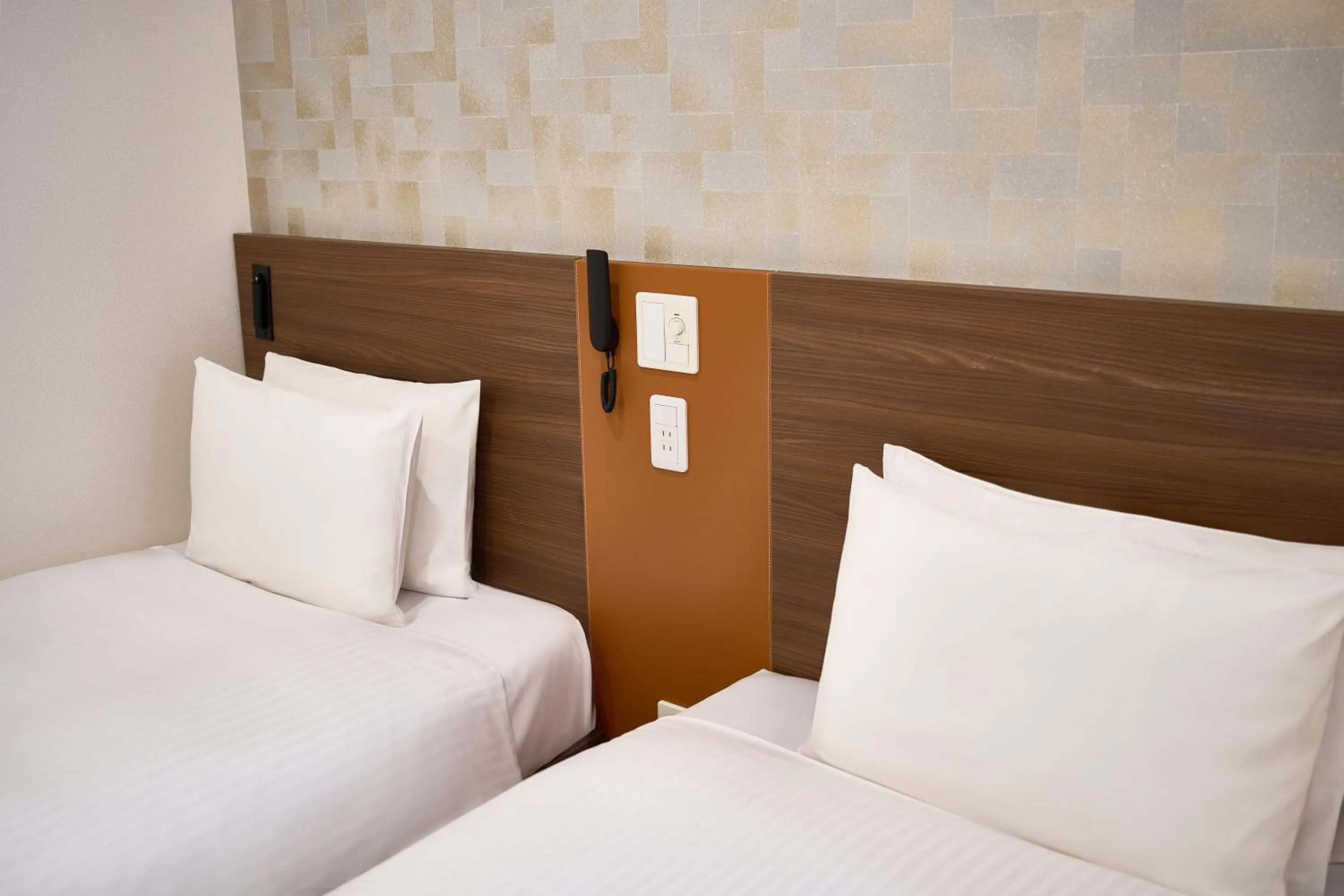 Bed in Nplus HOTEL Tokyo Nihonbashi