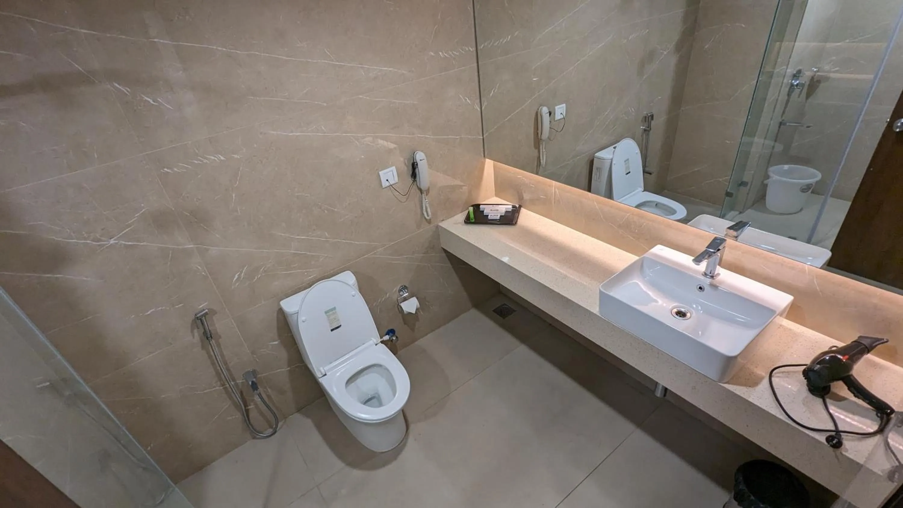 Shower in Pincode Hotels by Yatri Nivas