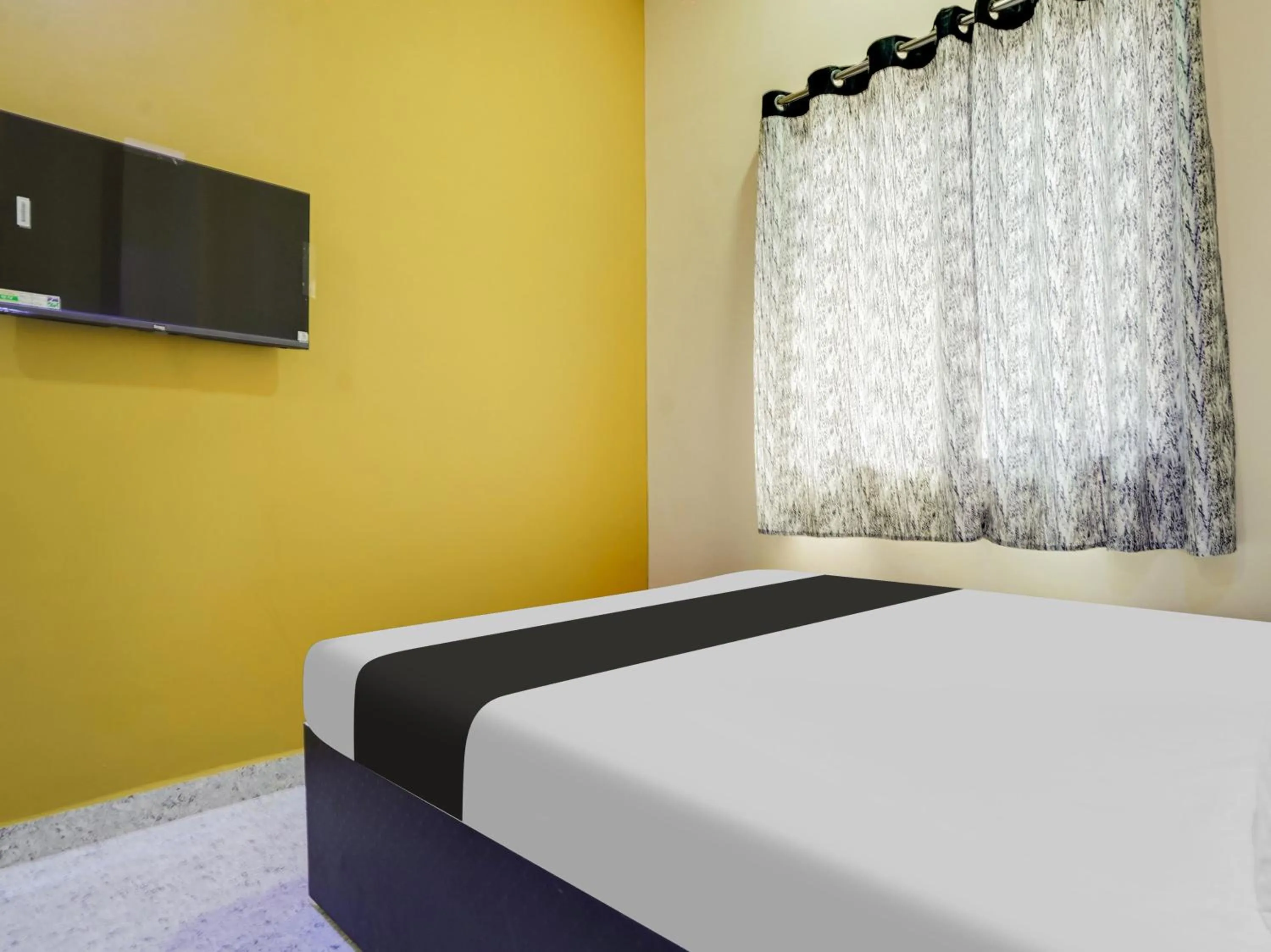 Bedroom in Hotel O RK