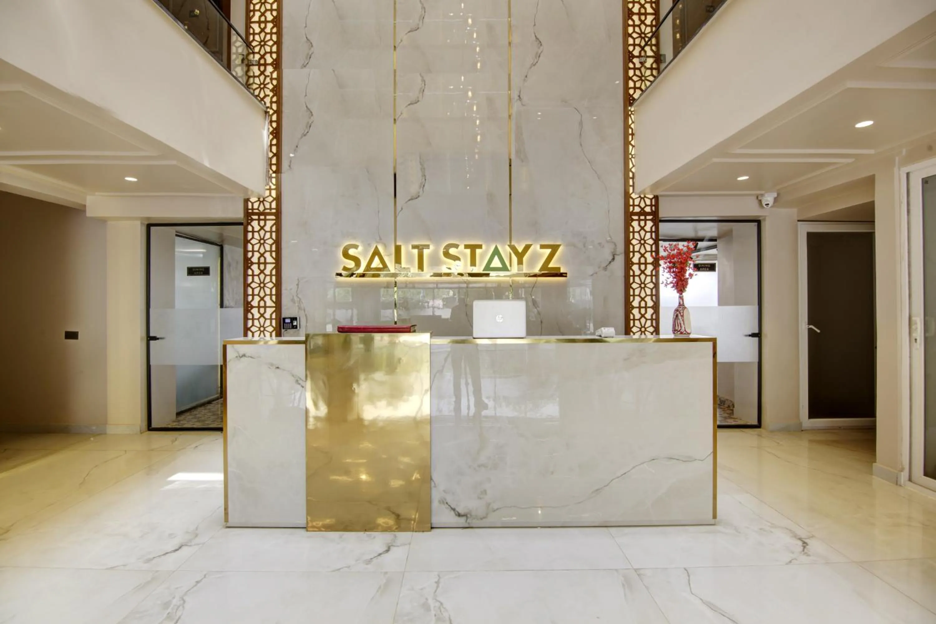 Property logo or sign in Saltstayz Premier - Near Golf Course Road & Sector 57