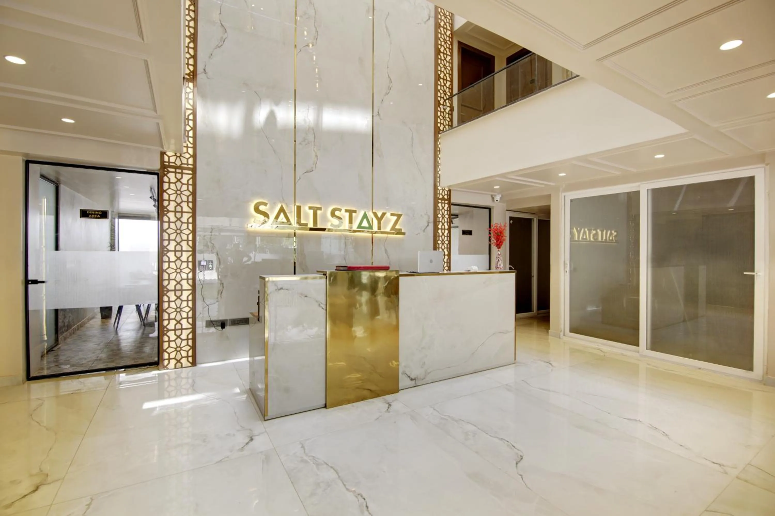 Property logo or sign in Saltstayz Premier - Near Golf Course Road & Sector 57