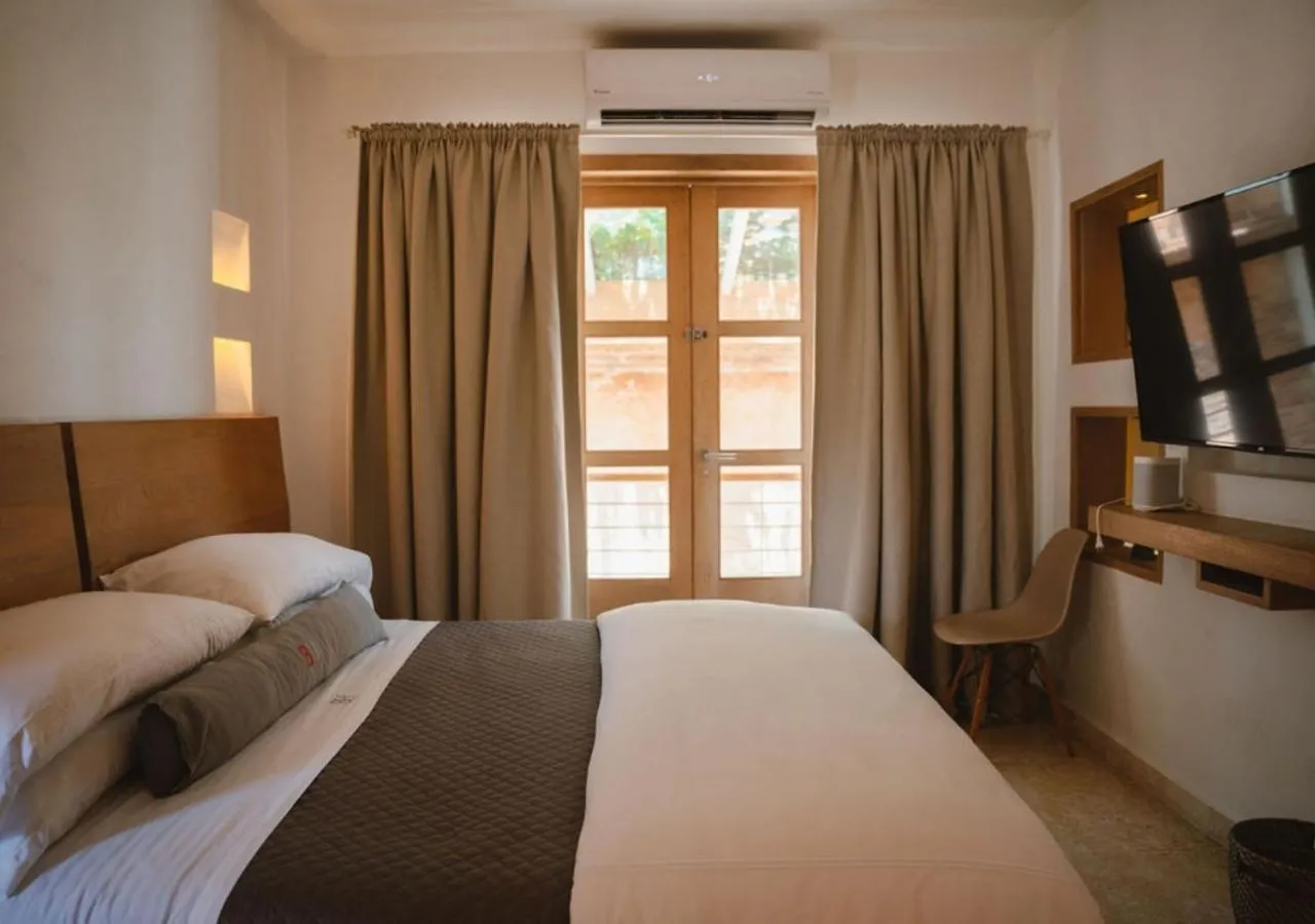 Bed in Billini Hotel, Historic Luxury