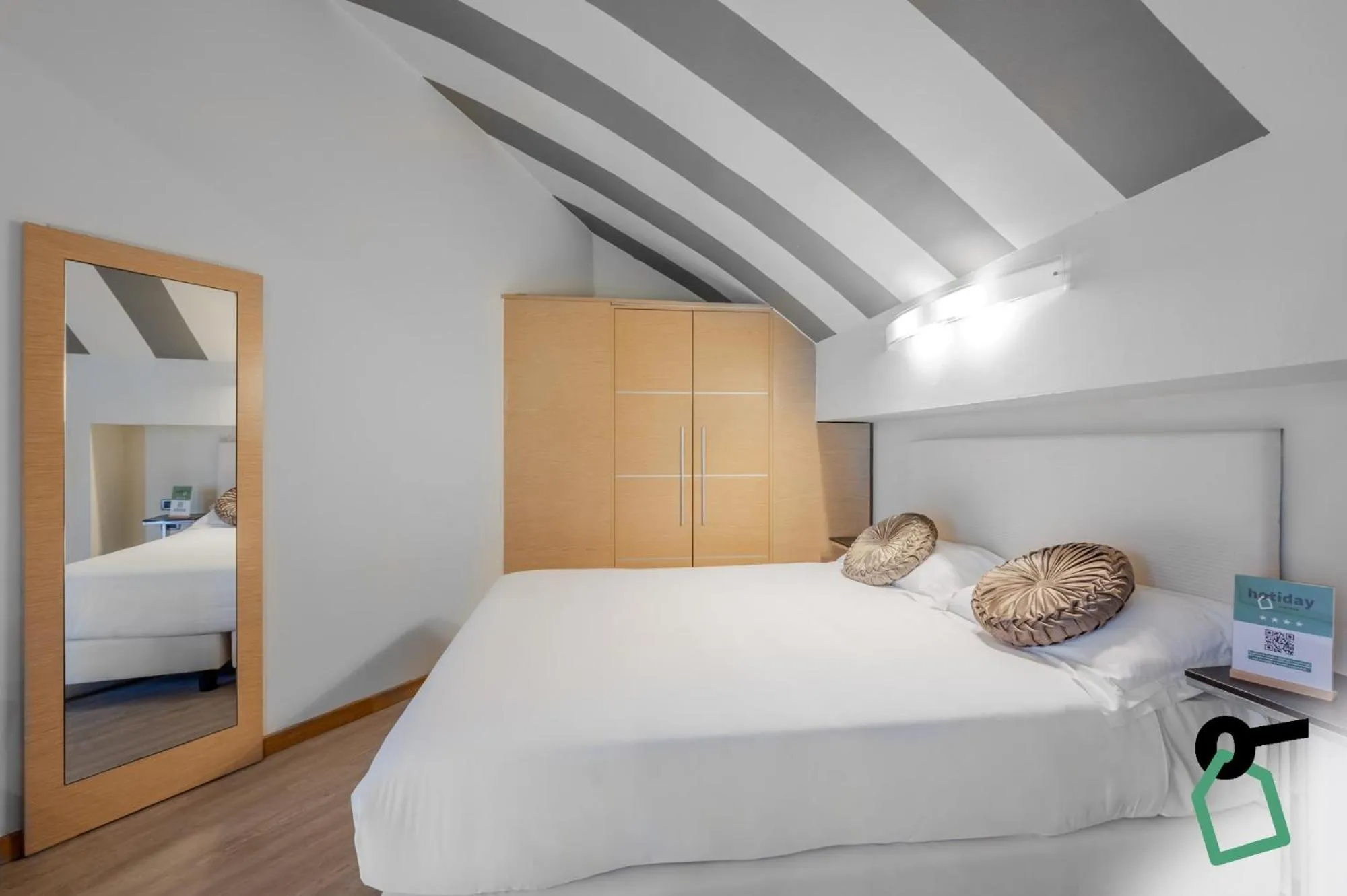 Bedroom in HOTIDAY ApartHotel Firenze