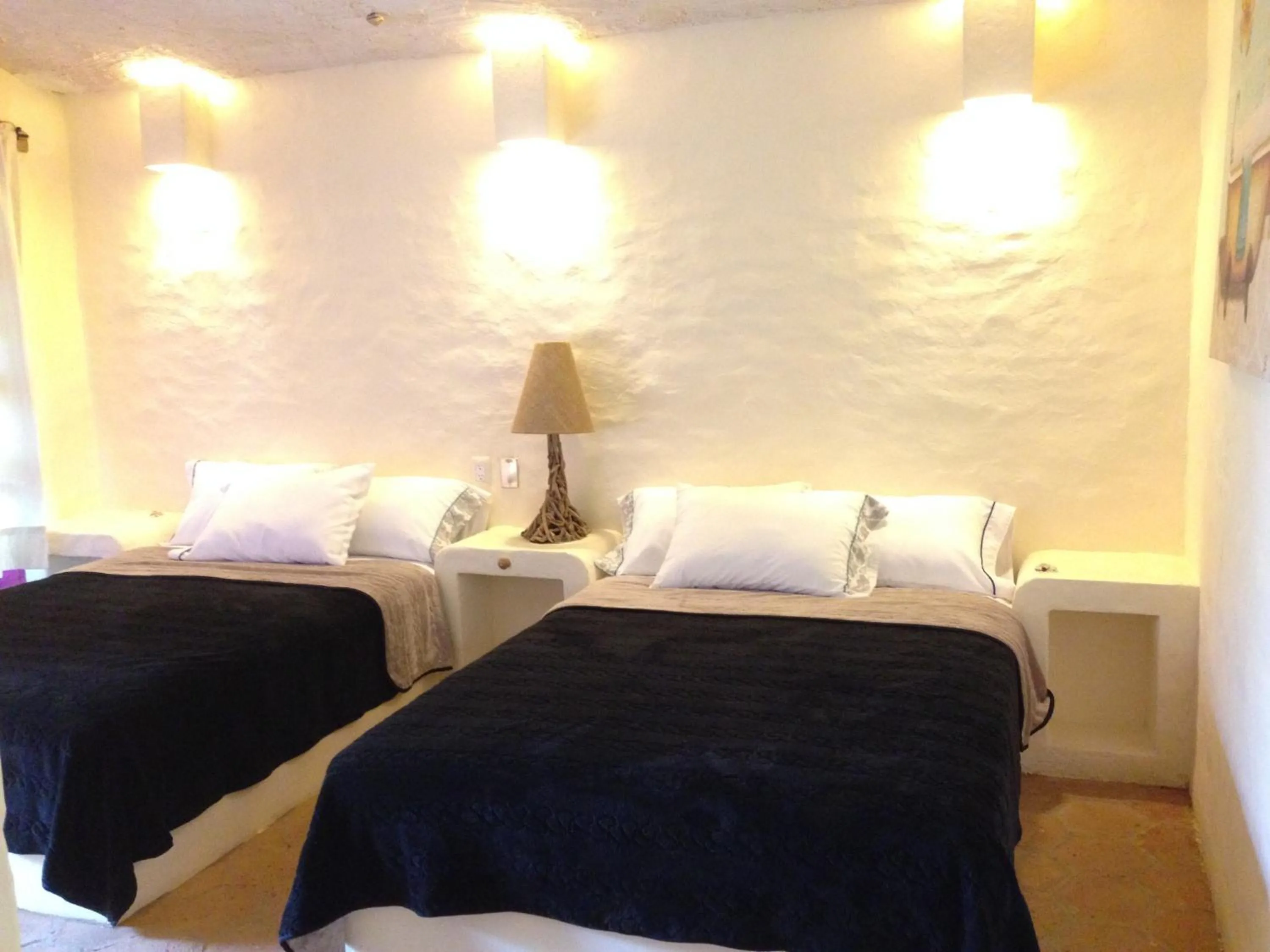 Double Room with Two Double Beds in Hotel Posada Primavera