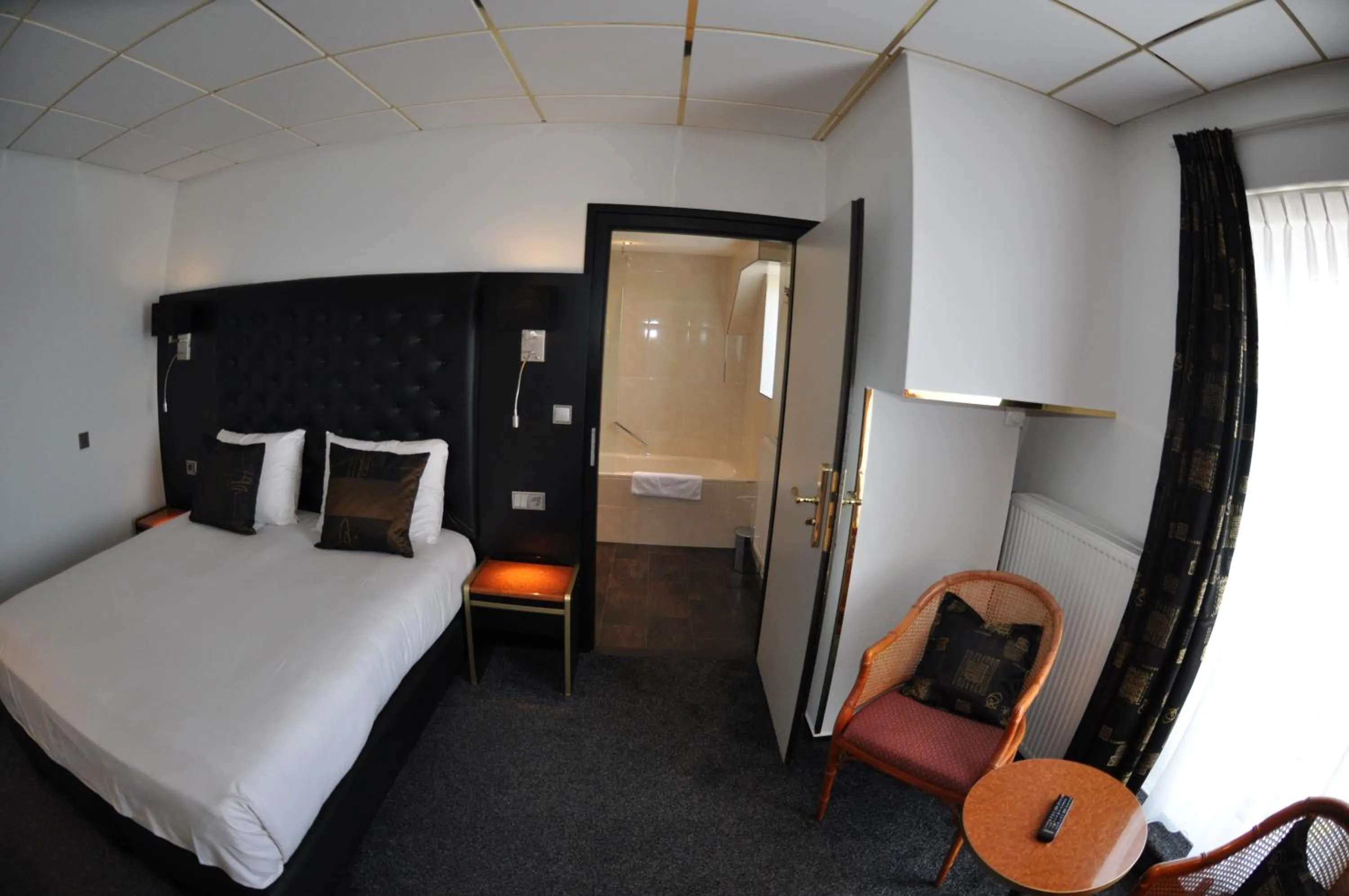 Bed in Hotel Le Beau Rivage