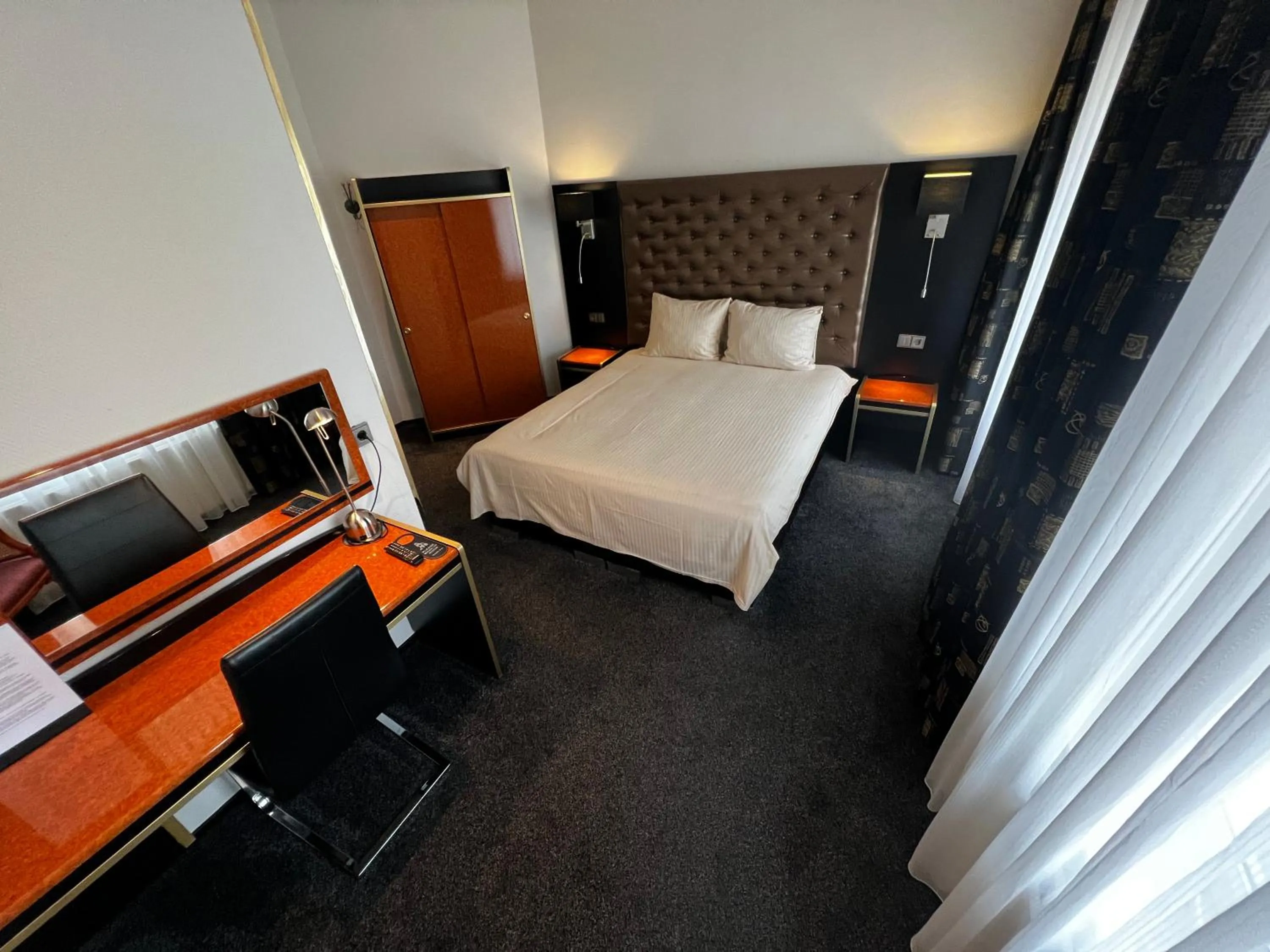 Bed in Hotel Le Beau Rivage