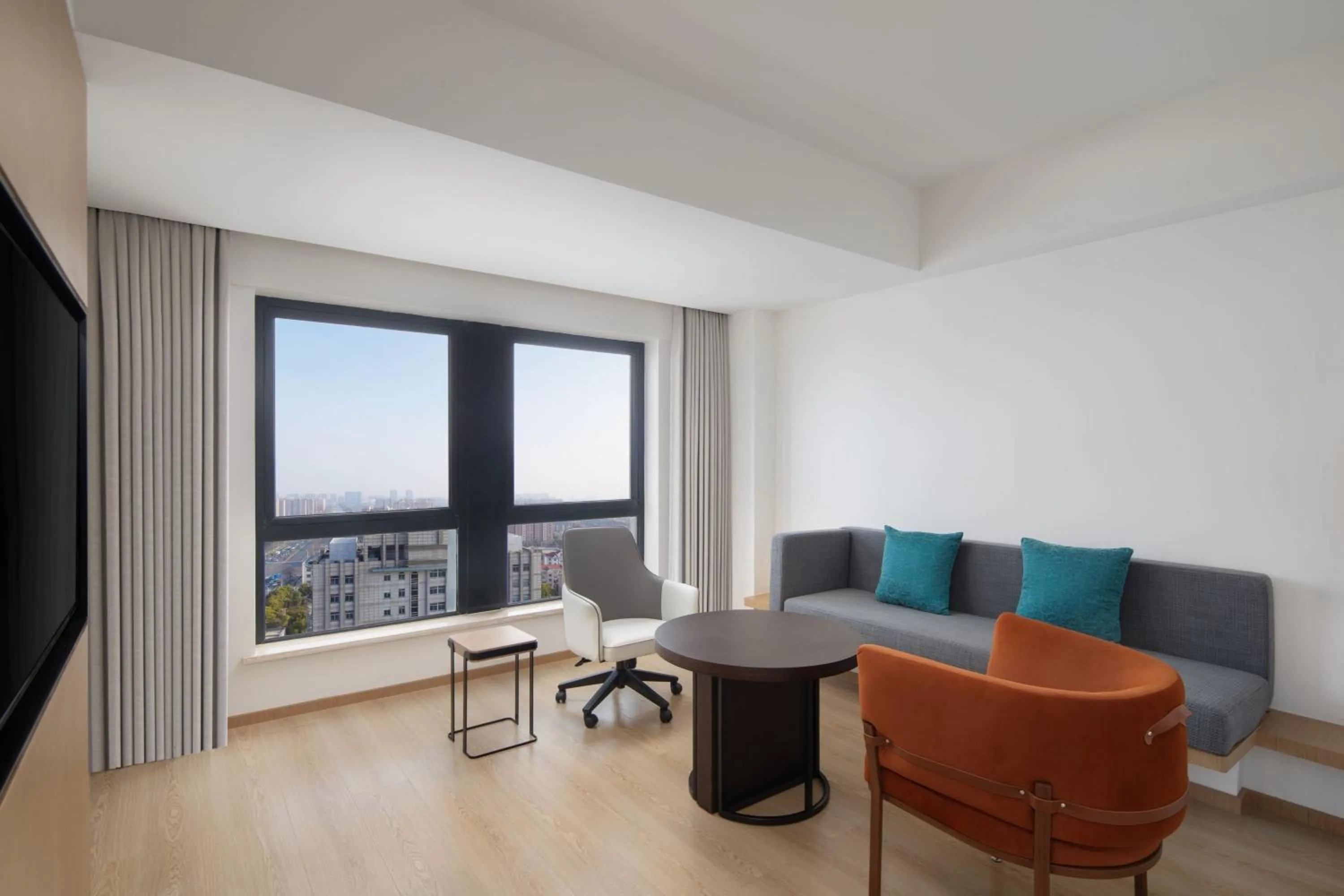 Living room, Seating Area in Ramada Plaza Pu Dong South Shanghai