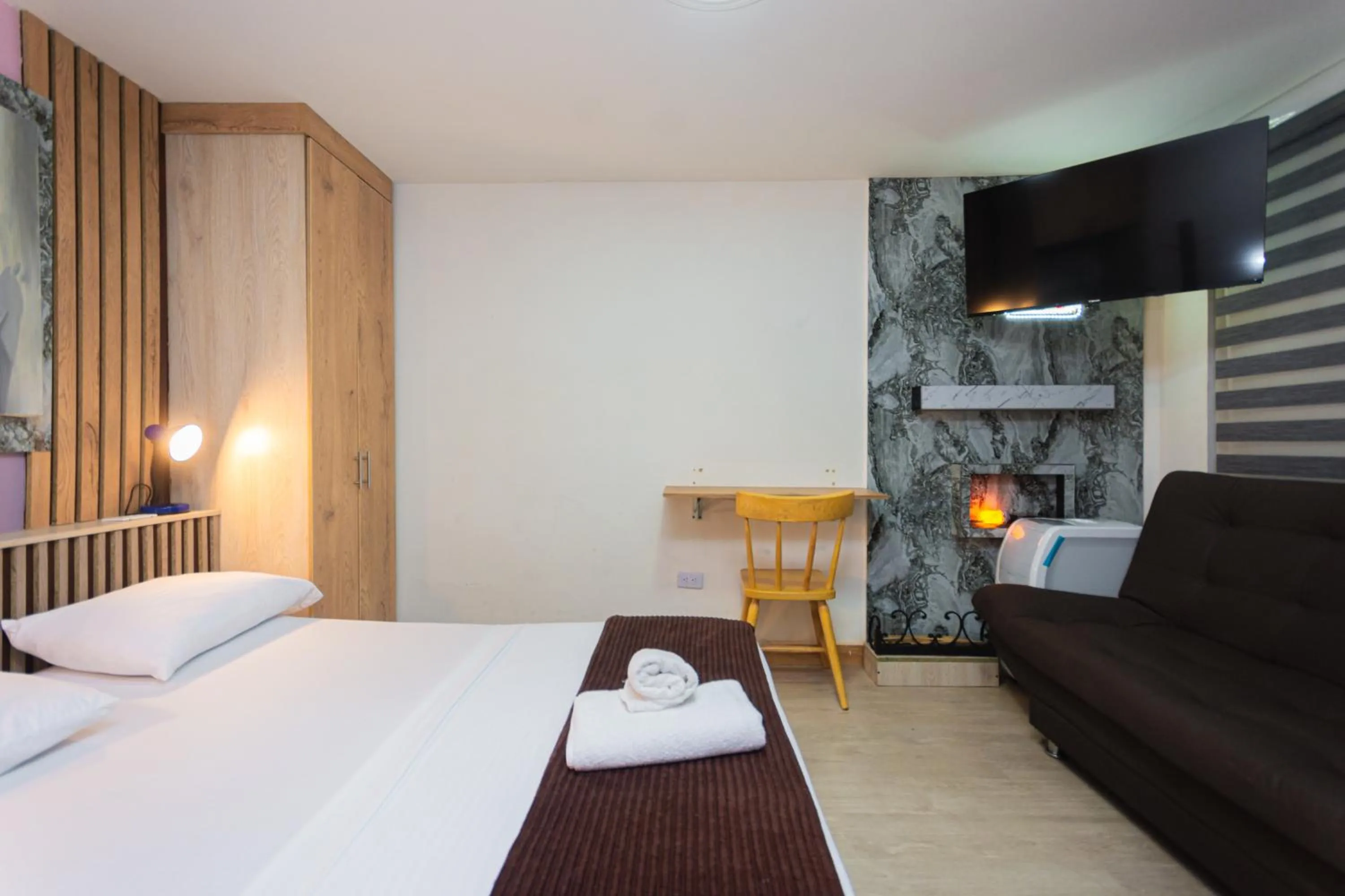 Photo of the whole room, Bed in Hotel Lares 70 Laureles