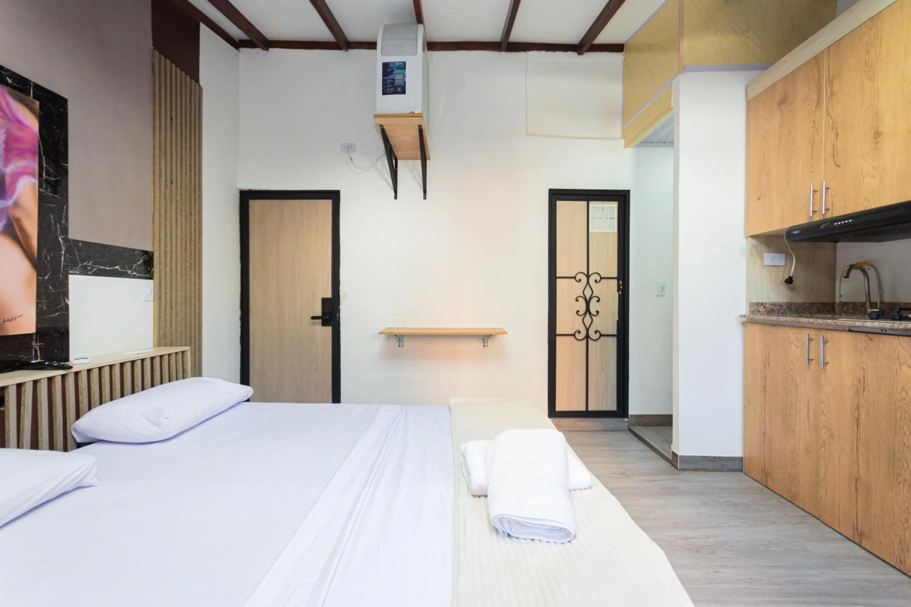 Kitchen or kitchenette, Bed in Hotel Lares 70 Laureles