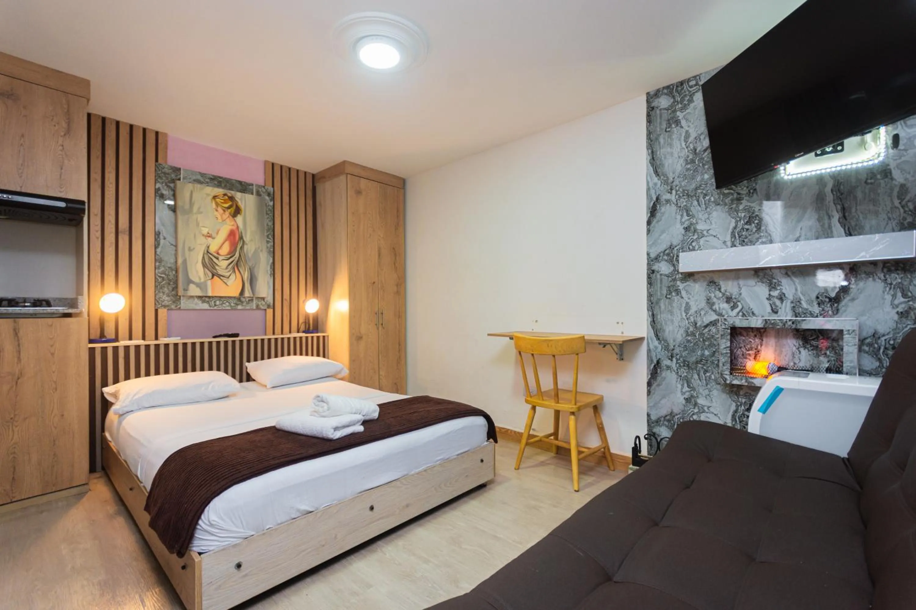 TV and multimedia, Bed in Hotel Lares 70 Laureles