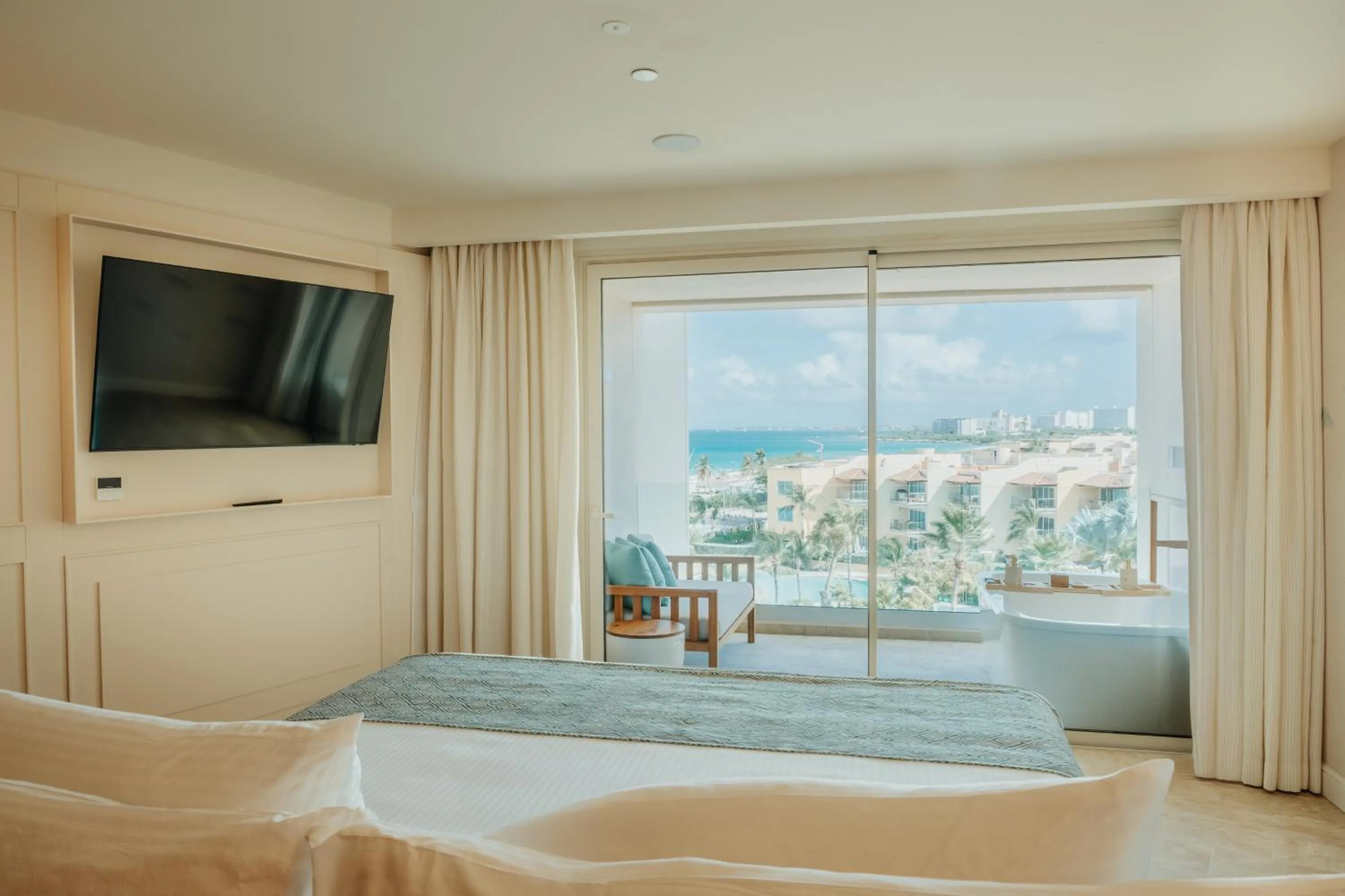 Bed in JOIA Aruba by Iberostar