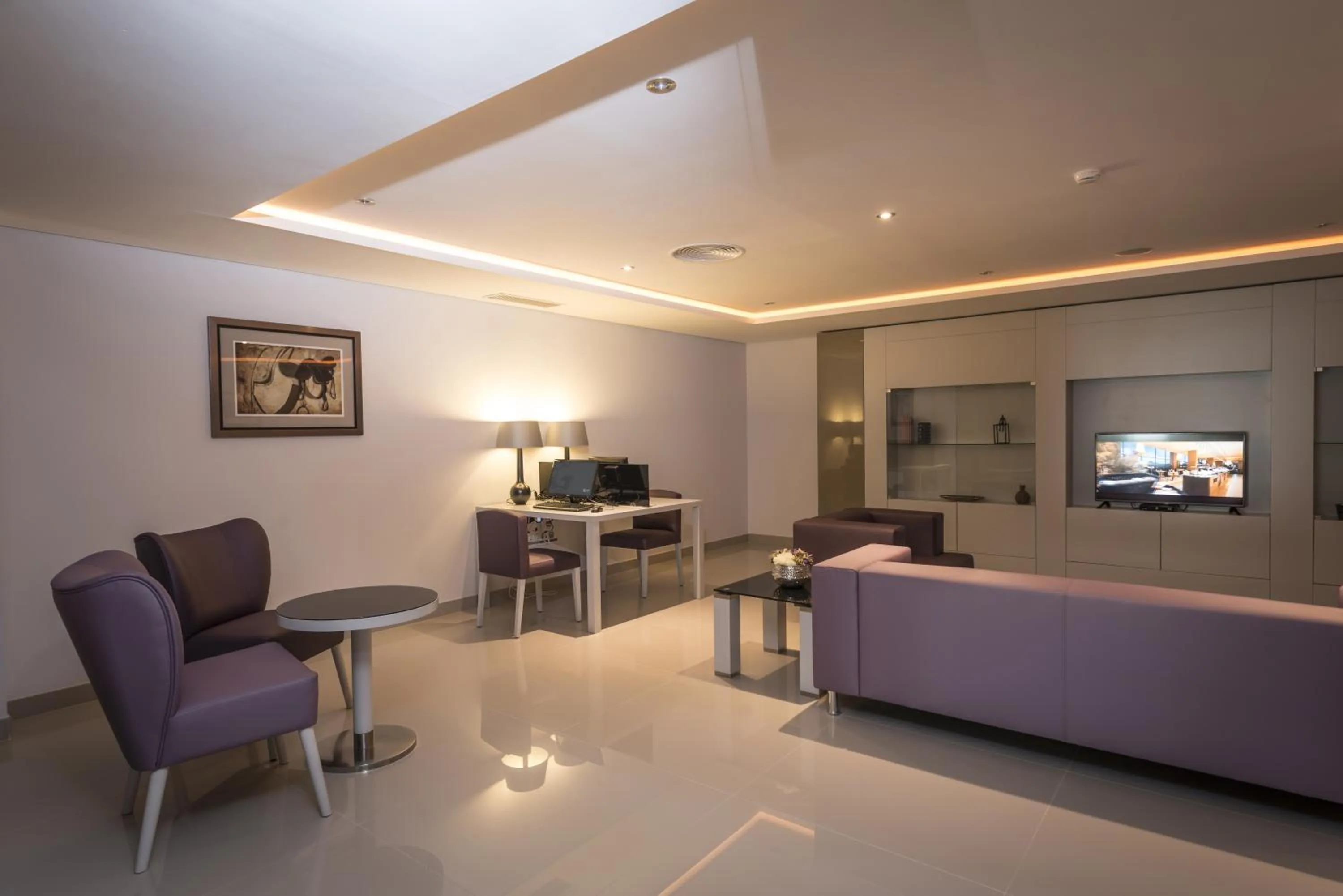 Communal lounge/ TV room in Vila Gale Evora