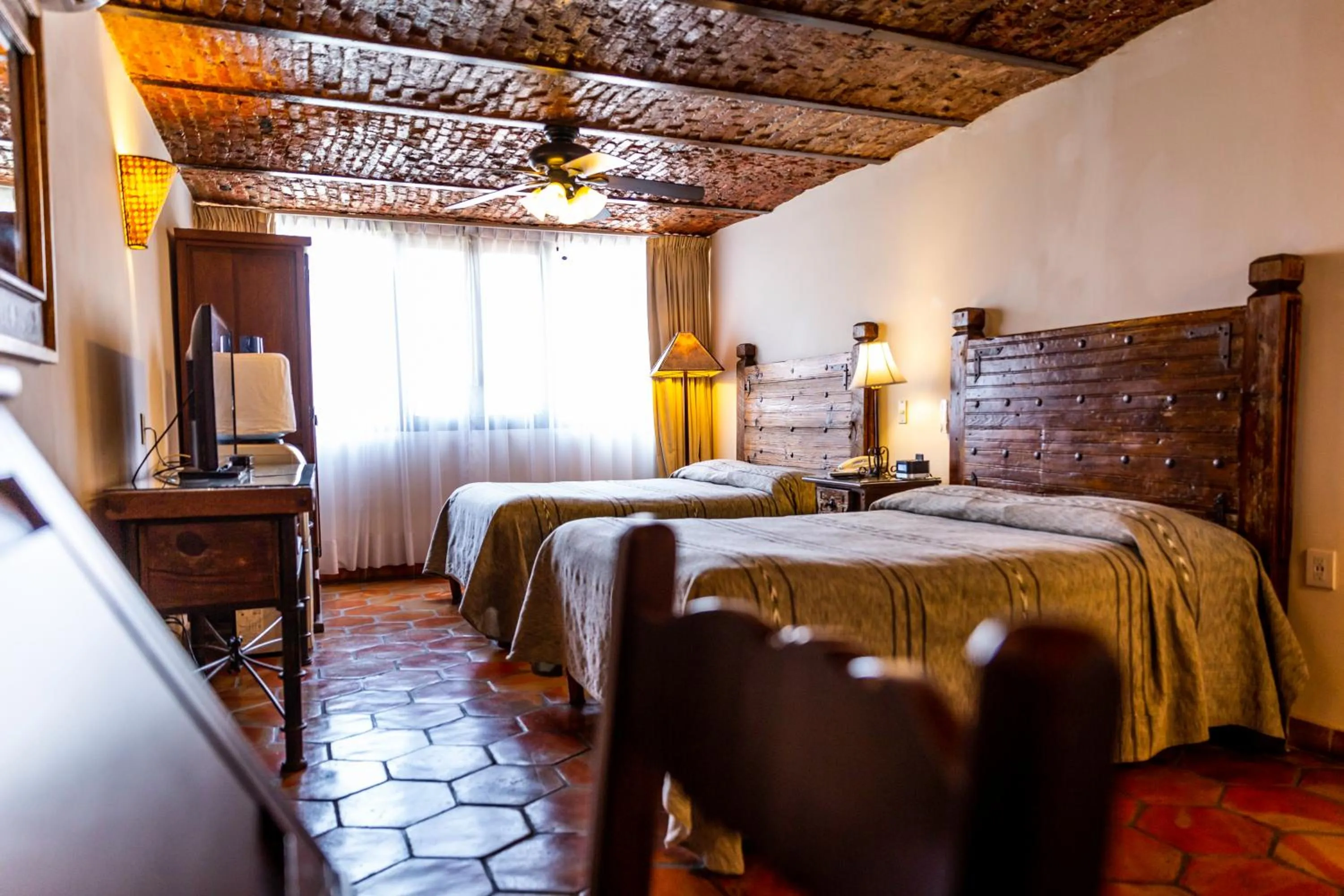 Bed in Quinta Don Jose Boutique Hotel