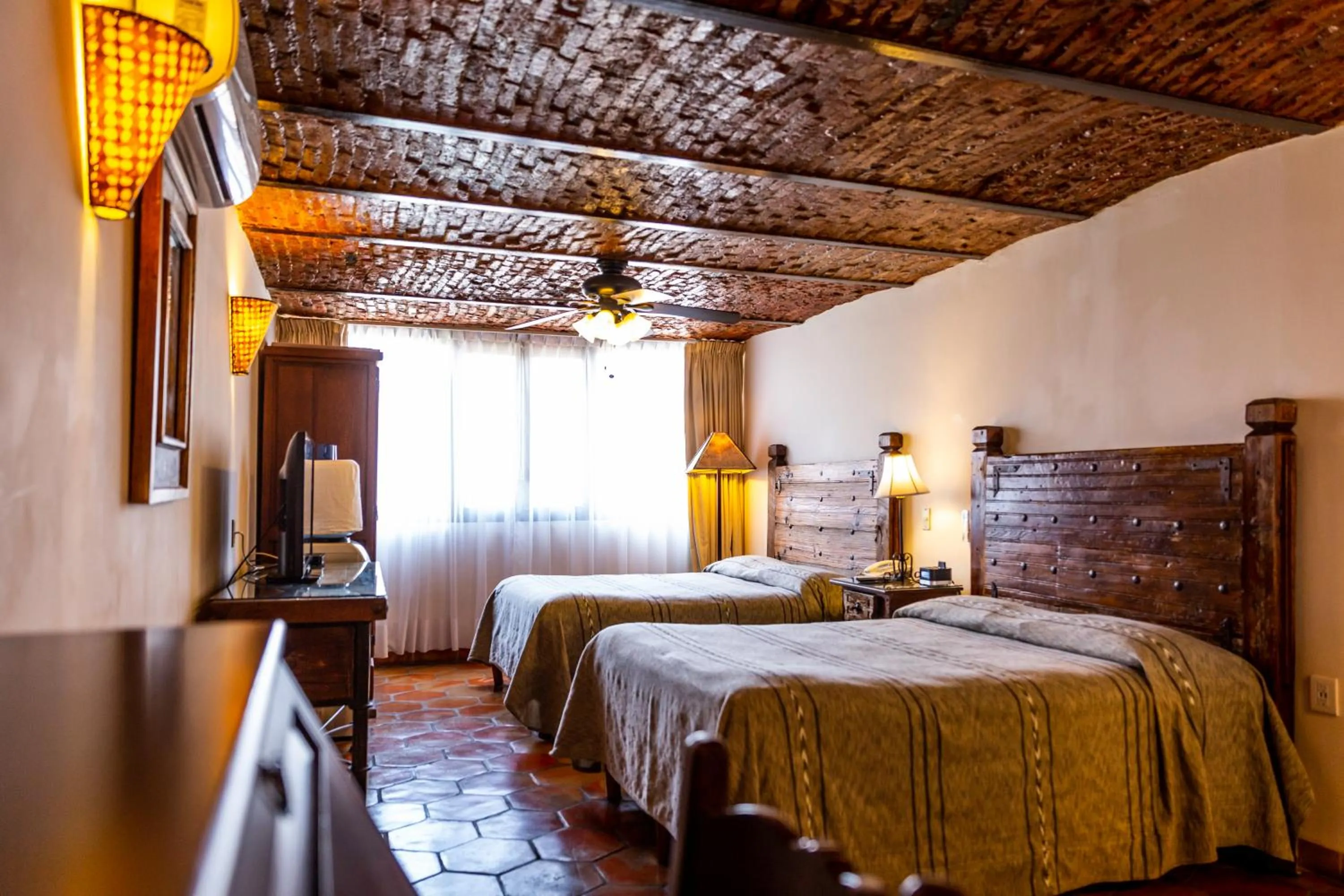 Bed in Quinta Don Jose Boutique Hotel