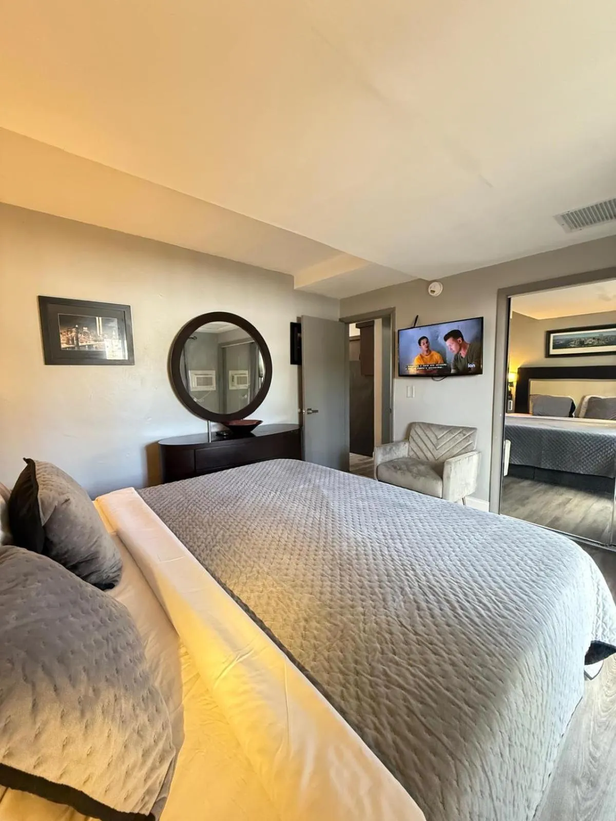 Bed in Sheridan Suites Apartments