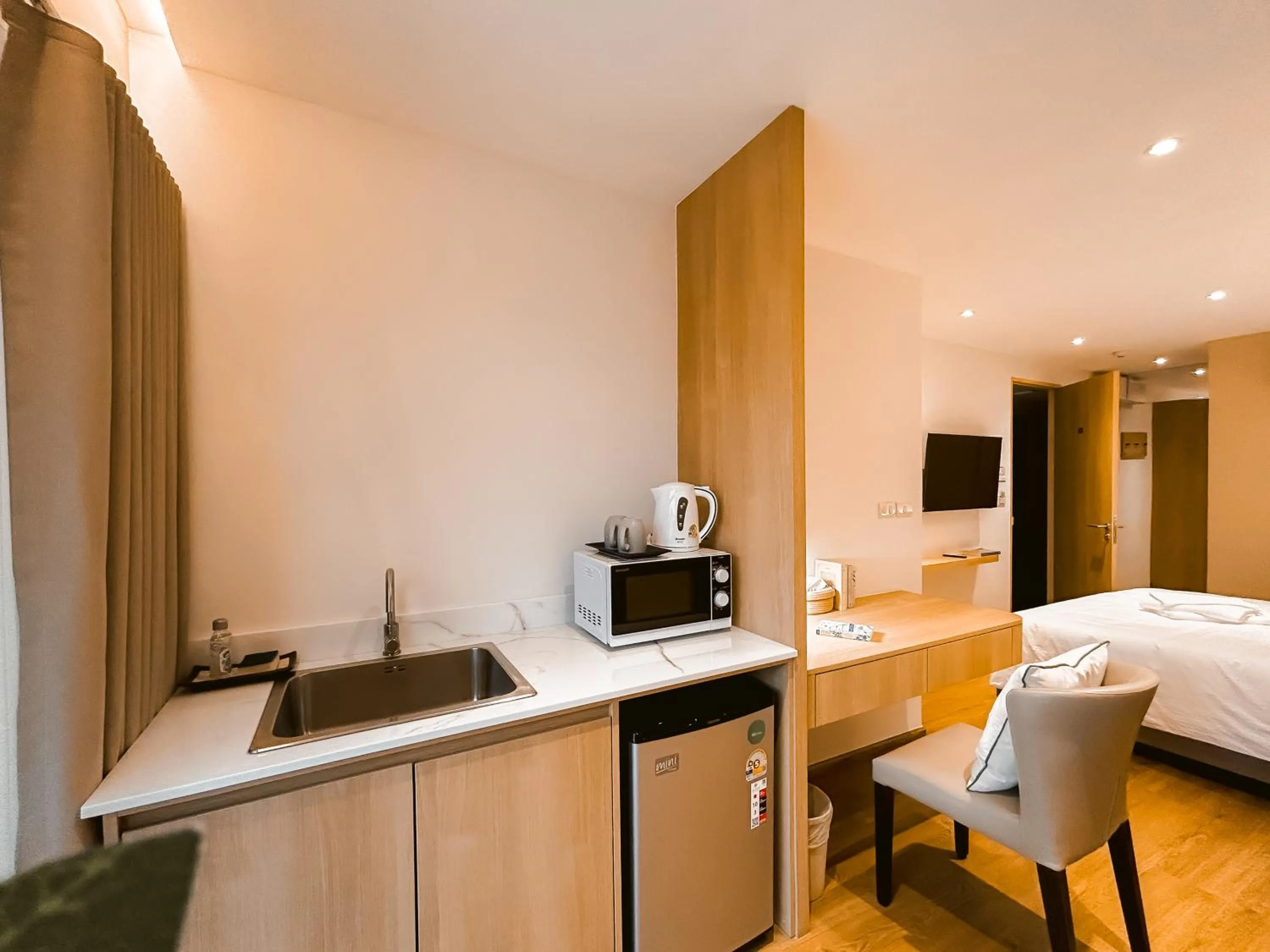 Kitchen or kitchenette, Bed in P.K. Garden Home