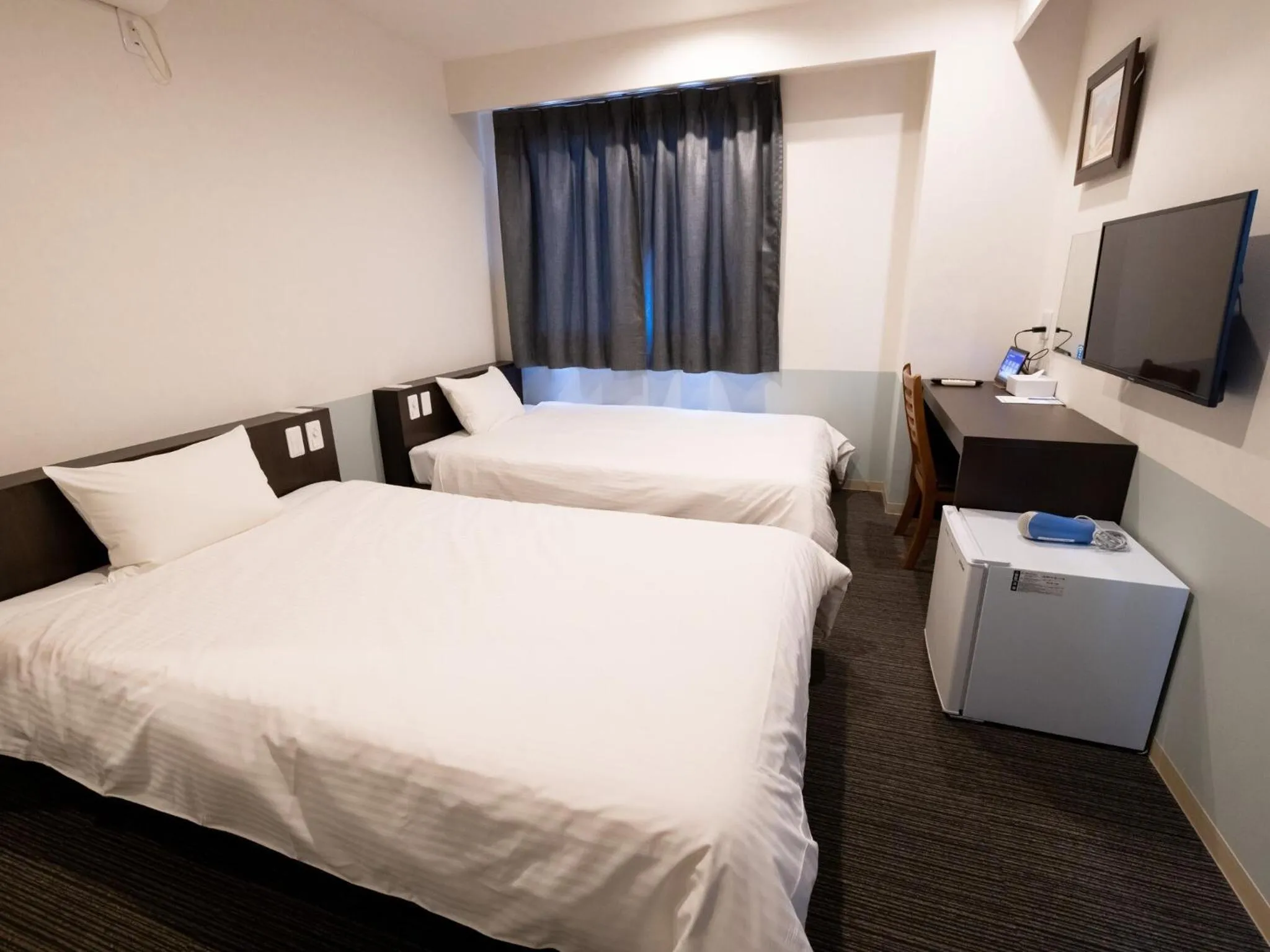 Photo of the whole room, Bed in Hotel Taiyo Noen Tokushima Kenchomae