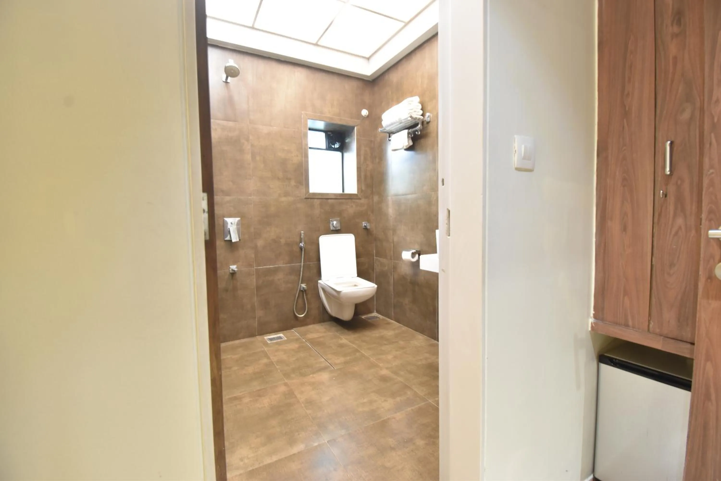 Toilet in The Aarya A Smart Business Hotel