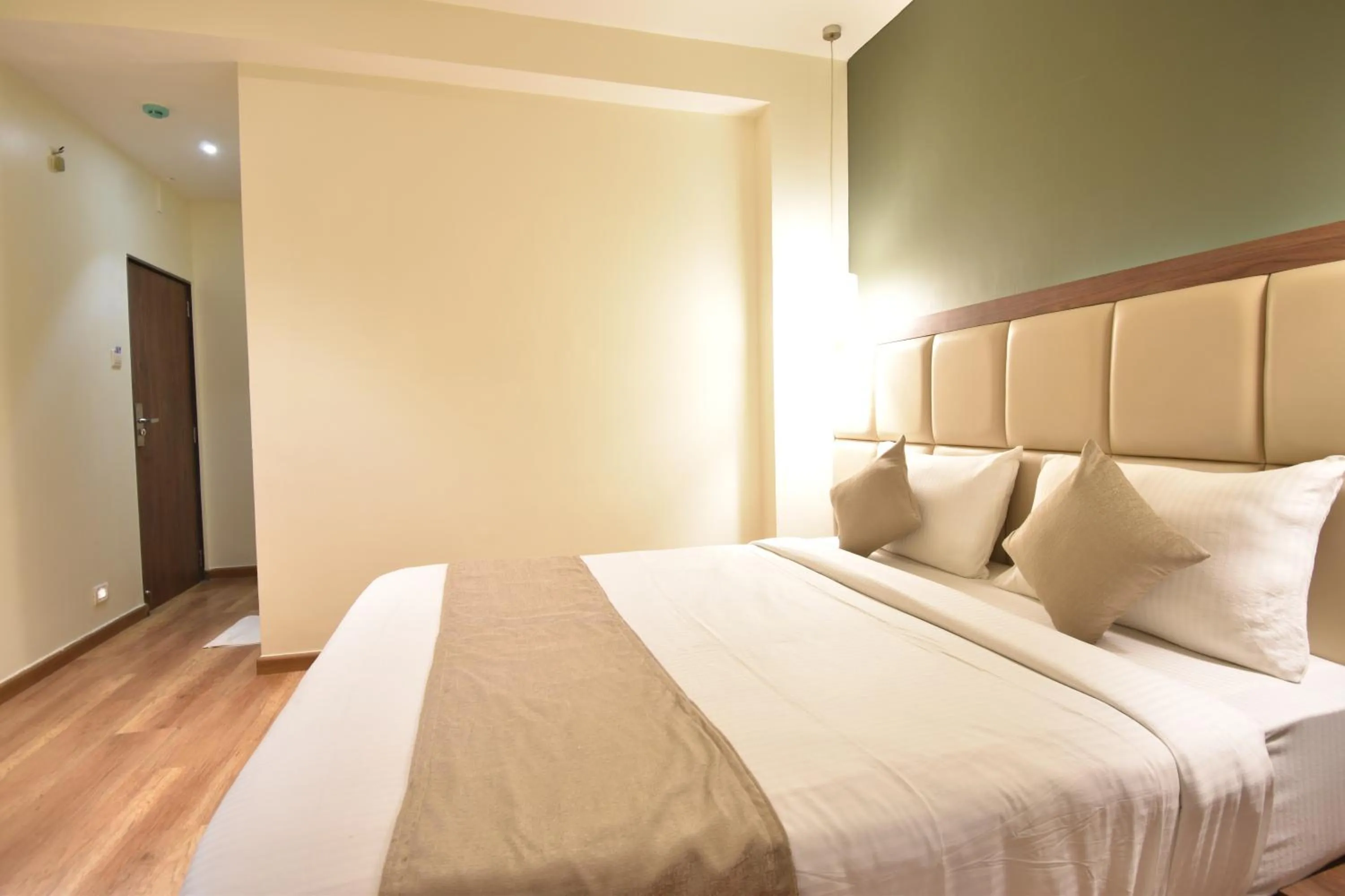Bedroom, Bed in The Aarya A Smart Business Hotel