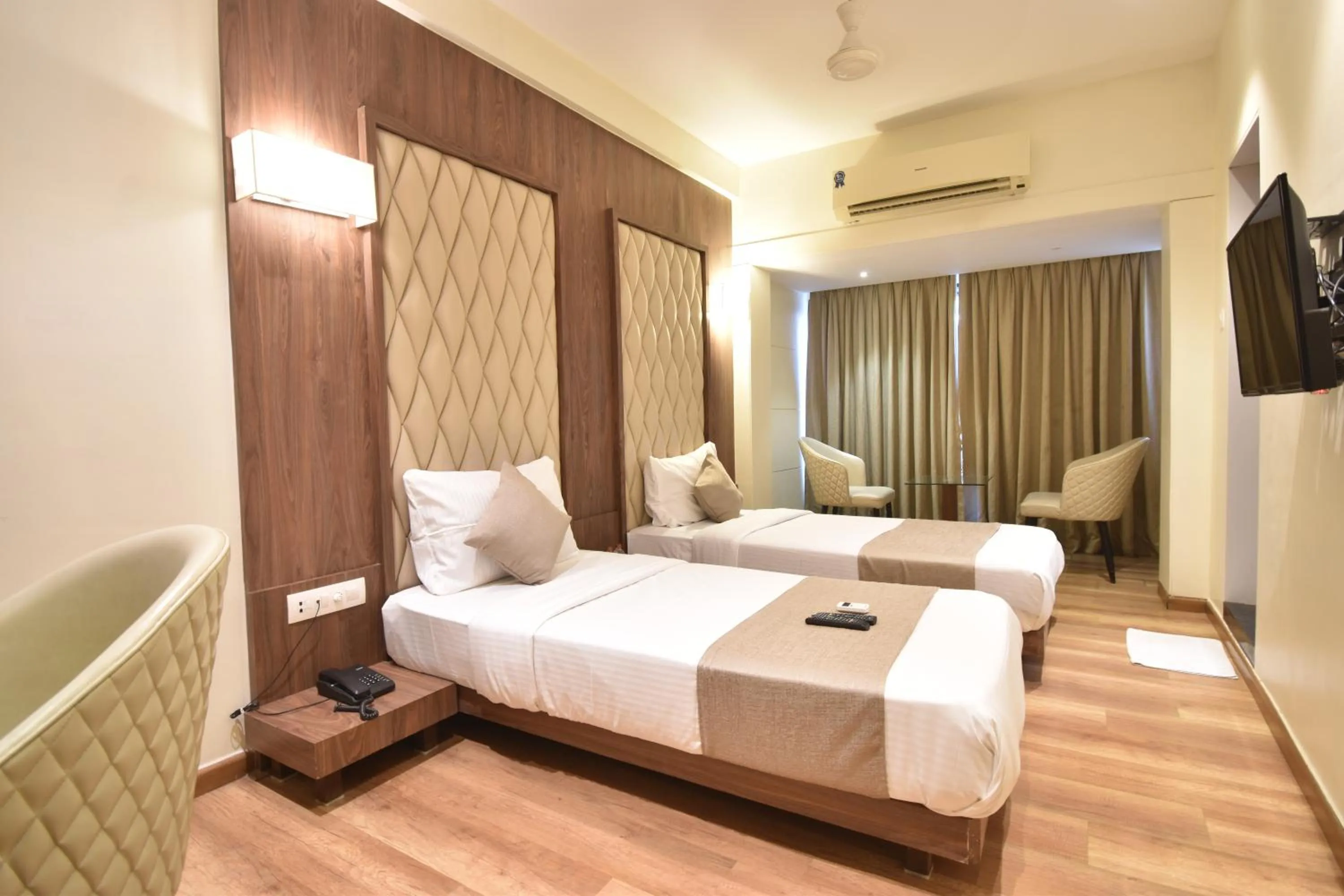 Bedroom, Bed in The Aarya A Smart Business Hotel