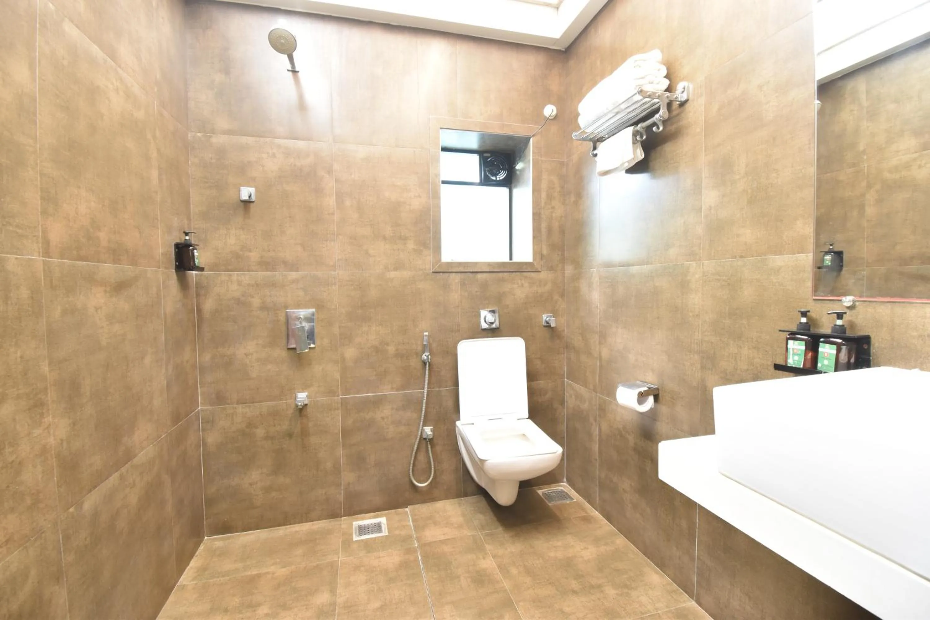 Bathroom in The Aarya A Smart Business Hotel