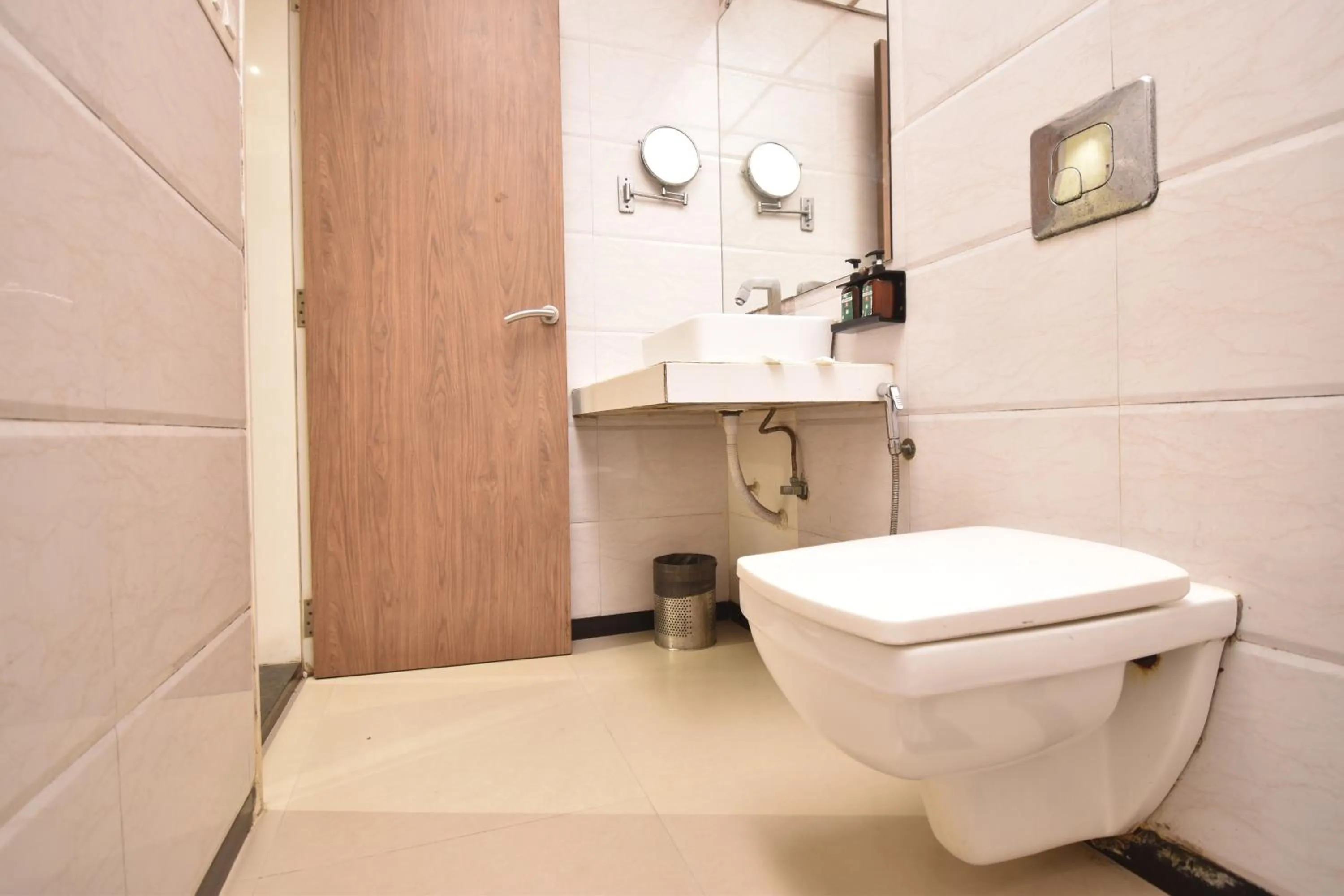 Toilet in The Aarya A Smart Business Hotel