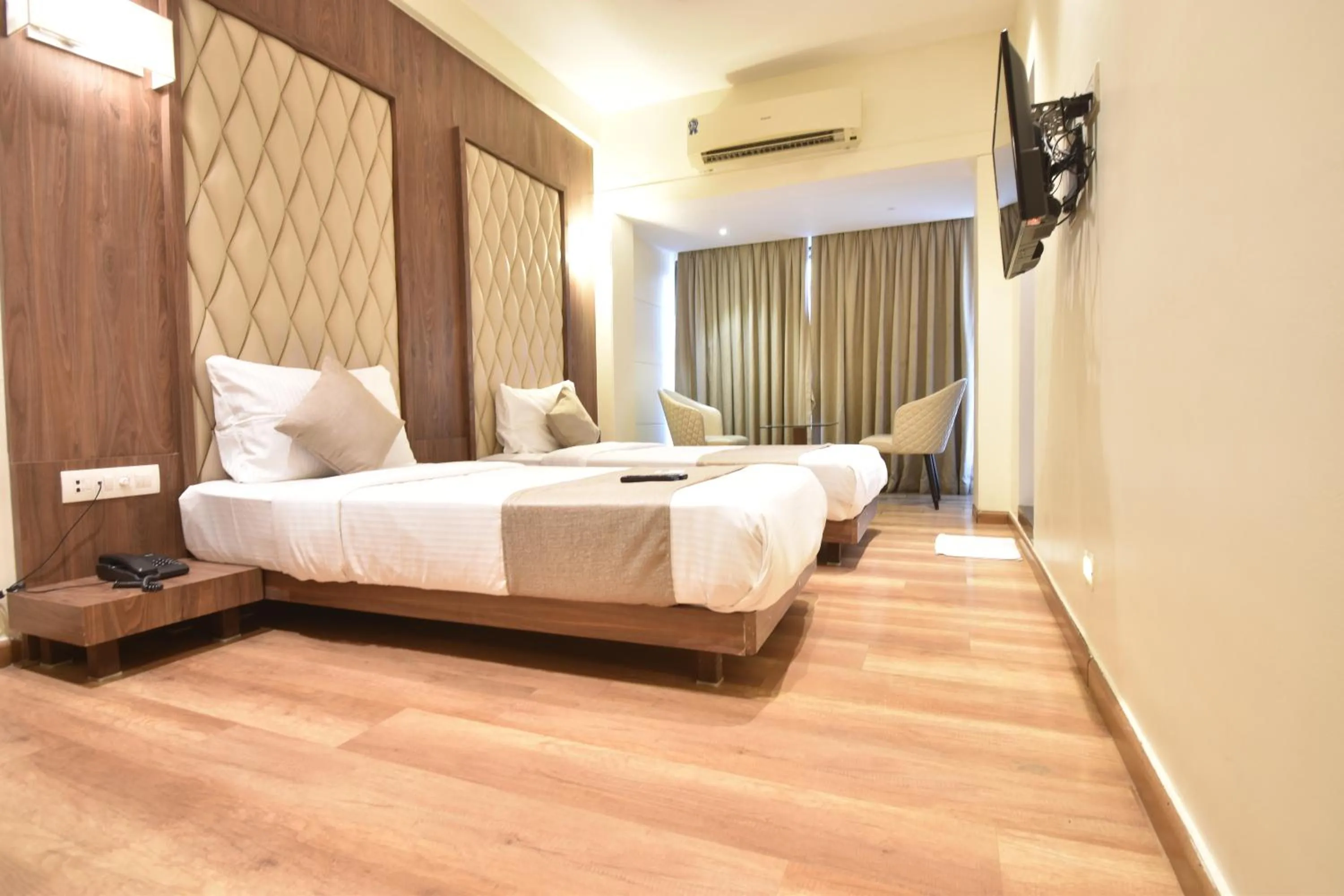 Bedroom, Bed in The Aarya A Smart Business Hotel