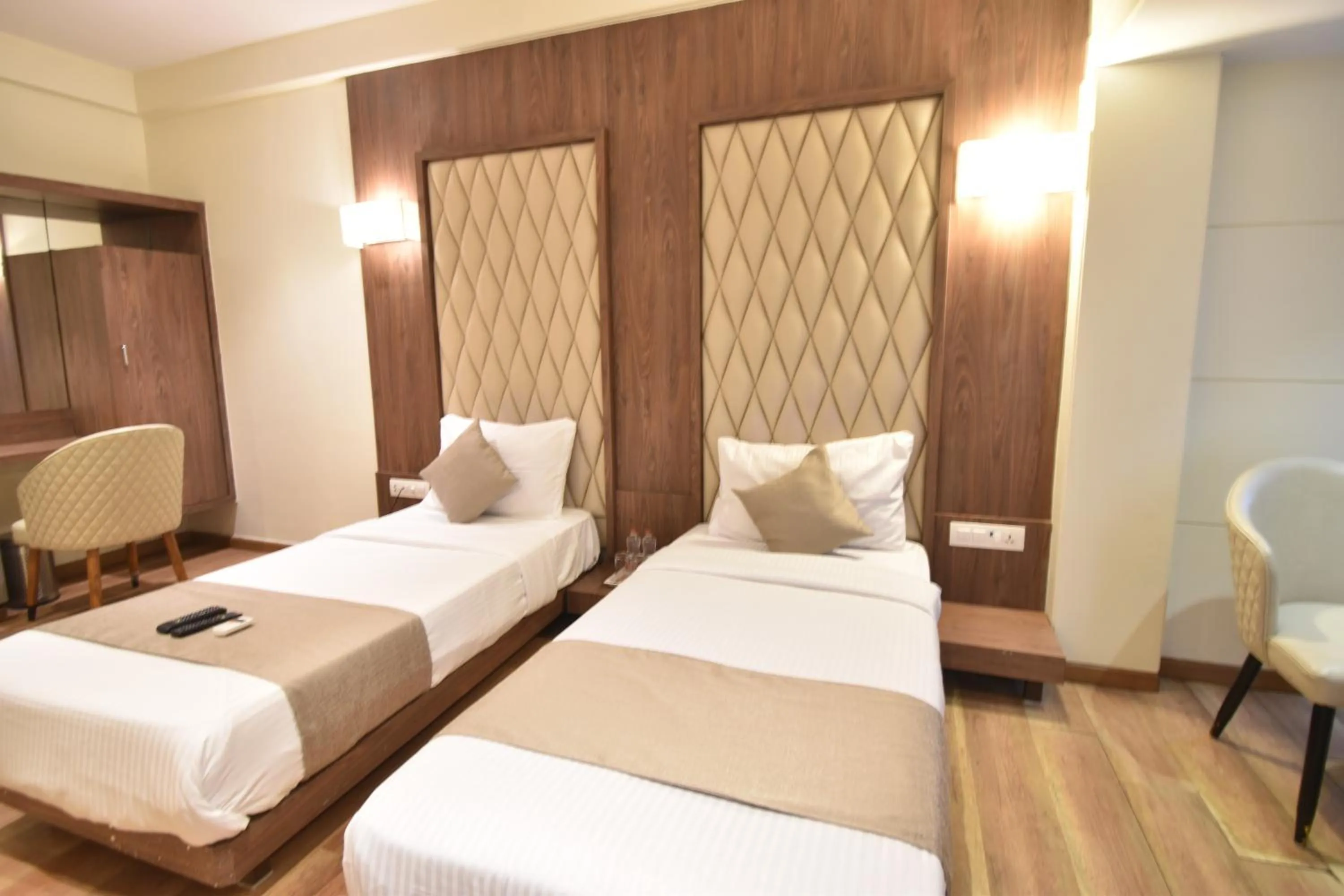 Photo of the whole room, Bed in The Aarya A Smart Business Hotel