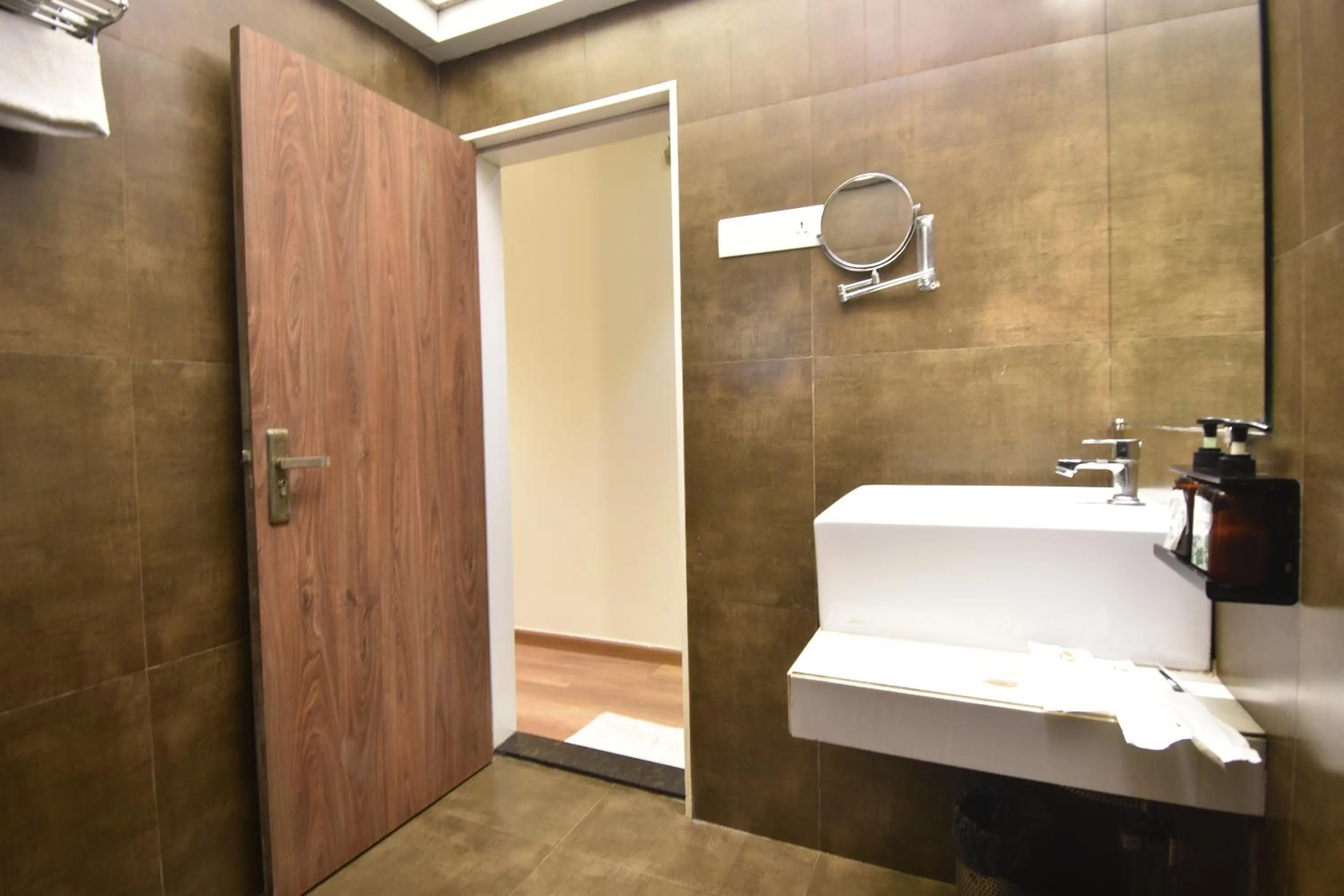 Bathroom in The Aarya A Smart Business Hotel