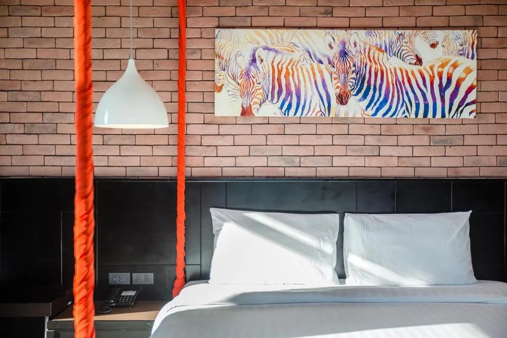 Bed in The Tama Hotel- SHA Plus