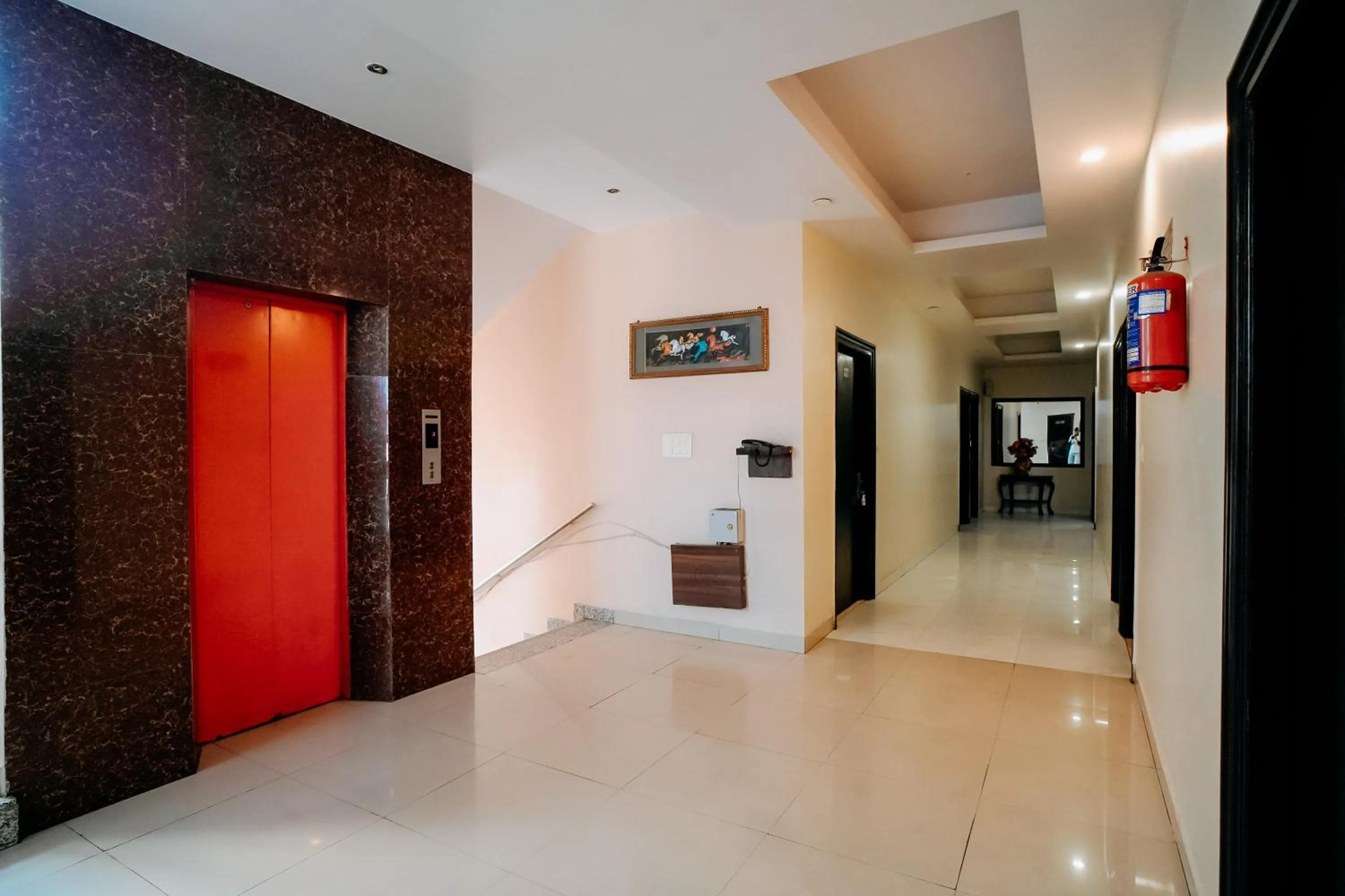 elevator in Hotel Jinendra Inn