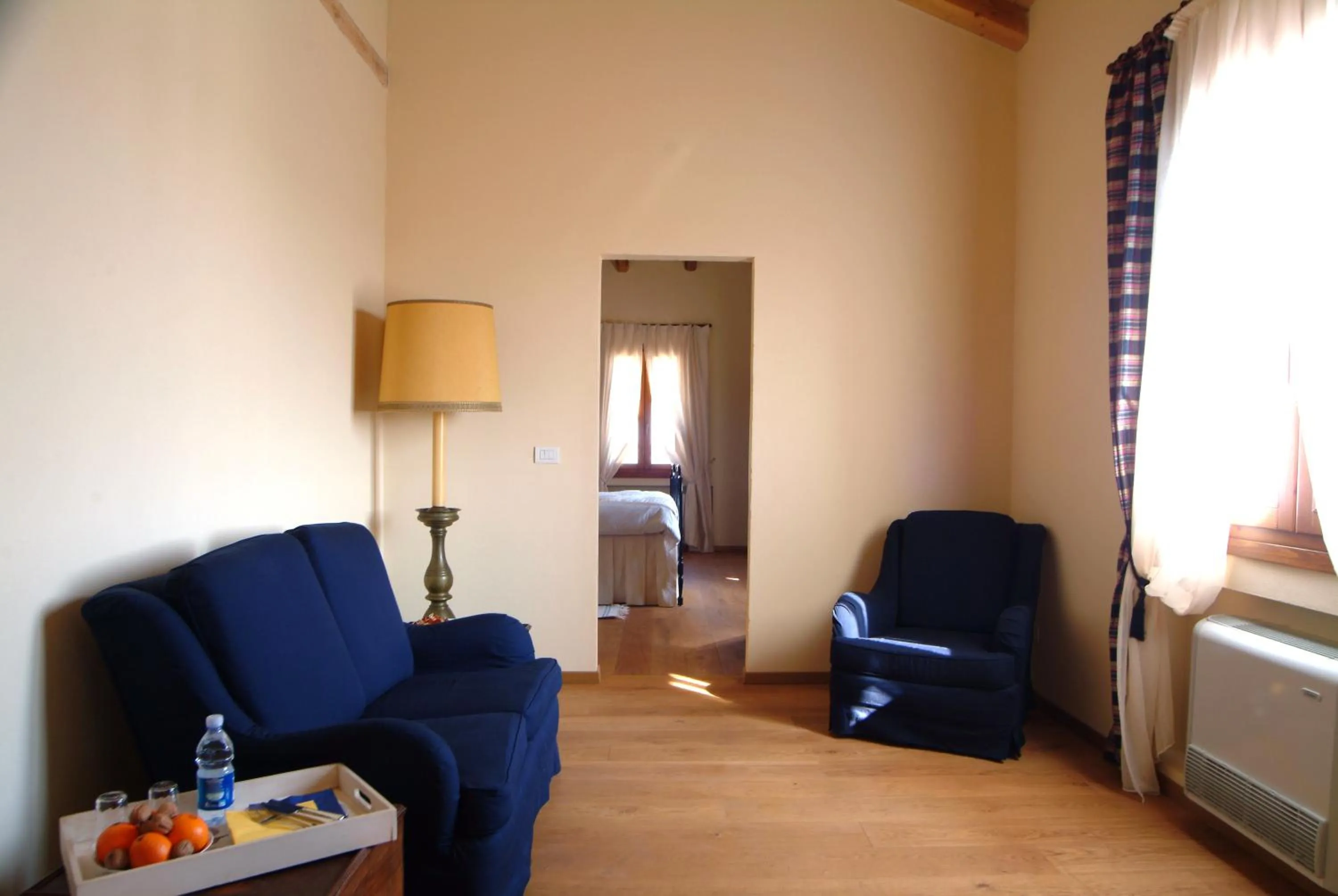 Communal lounge/ TV room in Al Podere Santa Cristina