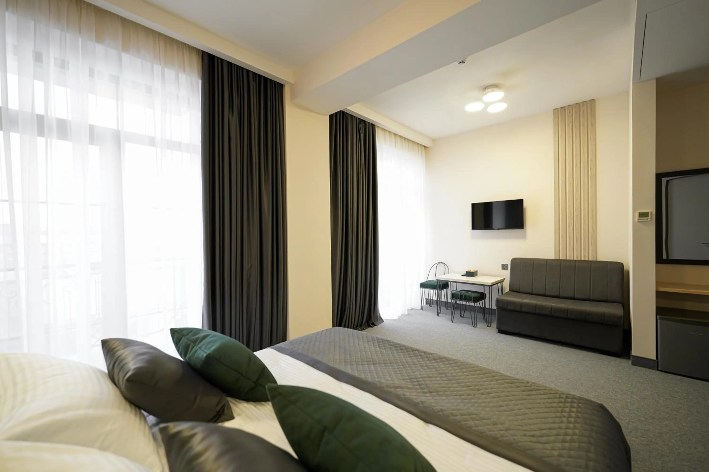 Photo of the whole room, Bed in Dynasty Hotel & SPA