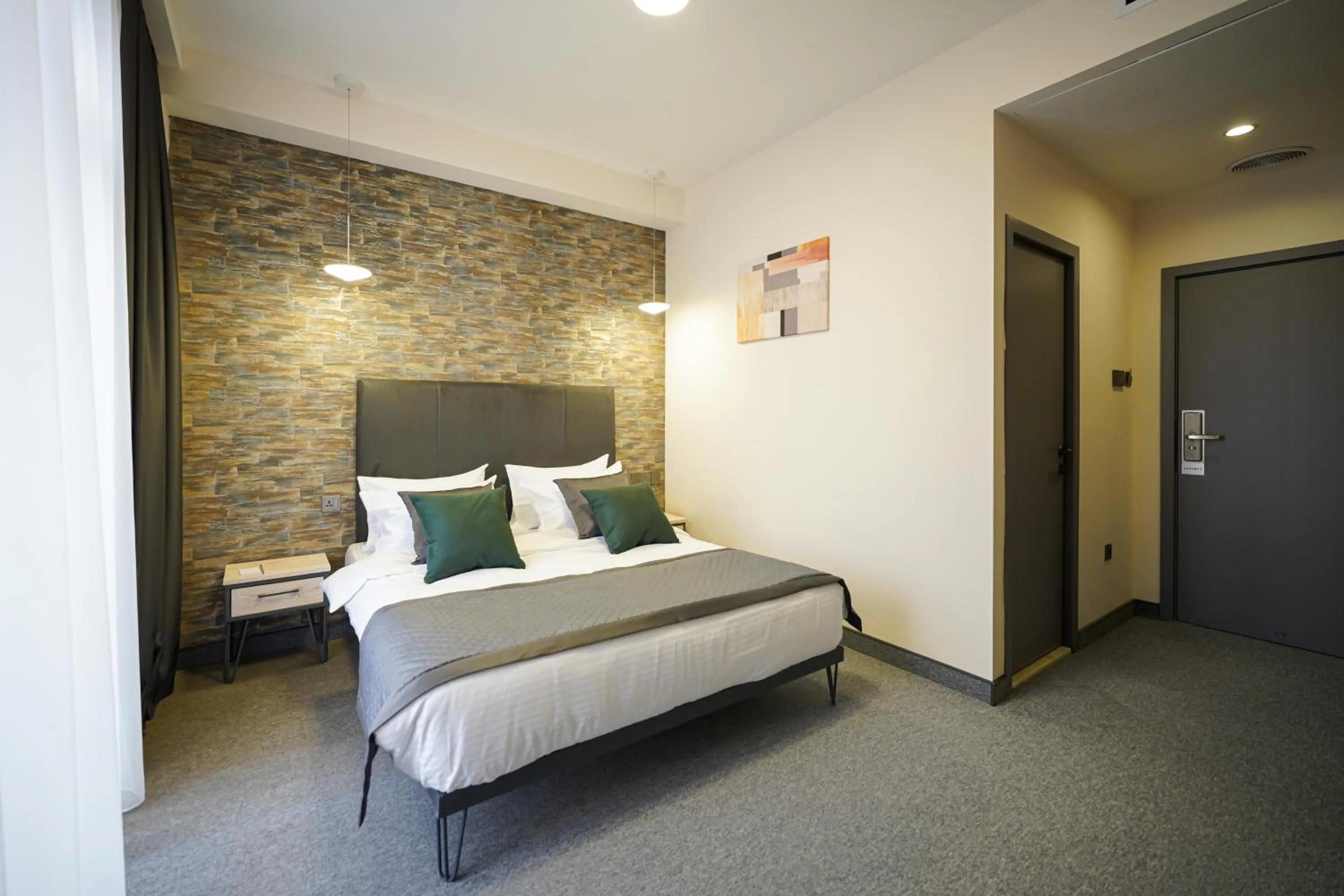 Bed in Dynasty Hotel & SPA