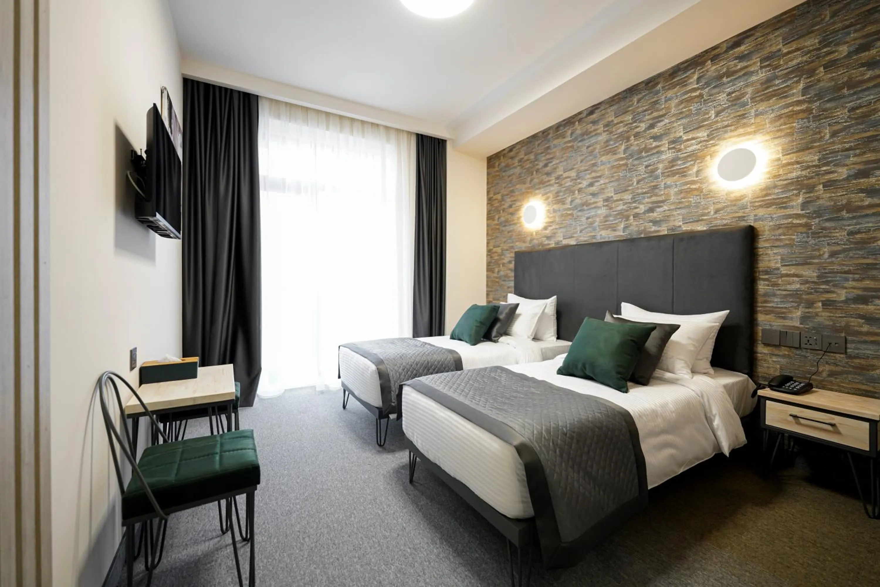 Bed in Dynasty Hotel & SPA