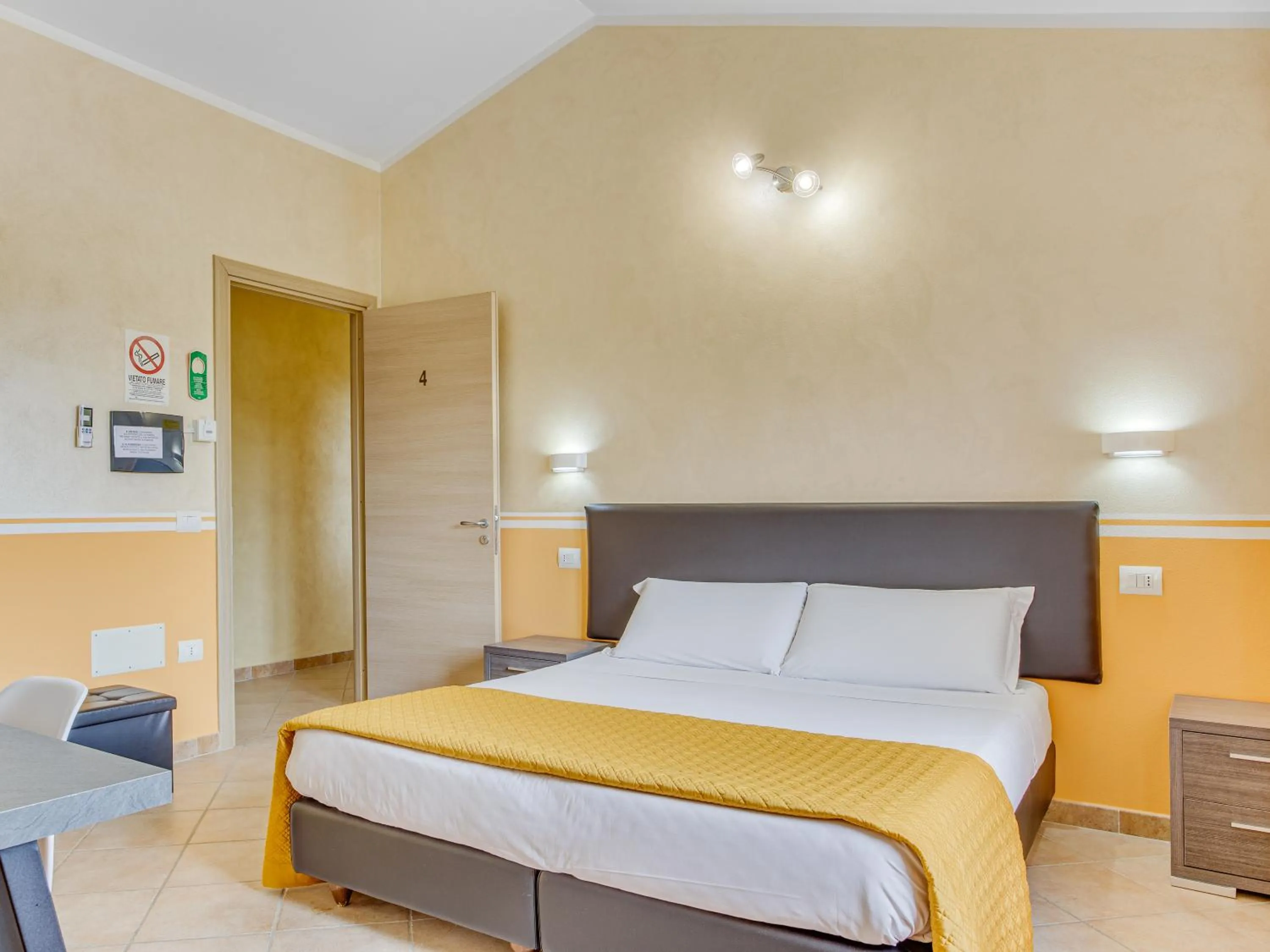 Bed in MEMO'S Affittacamere