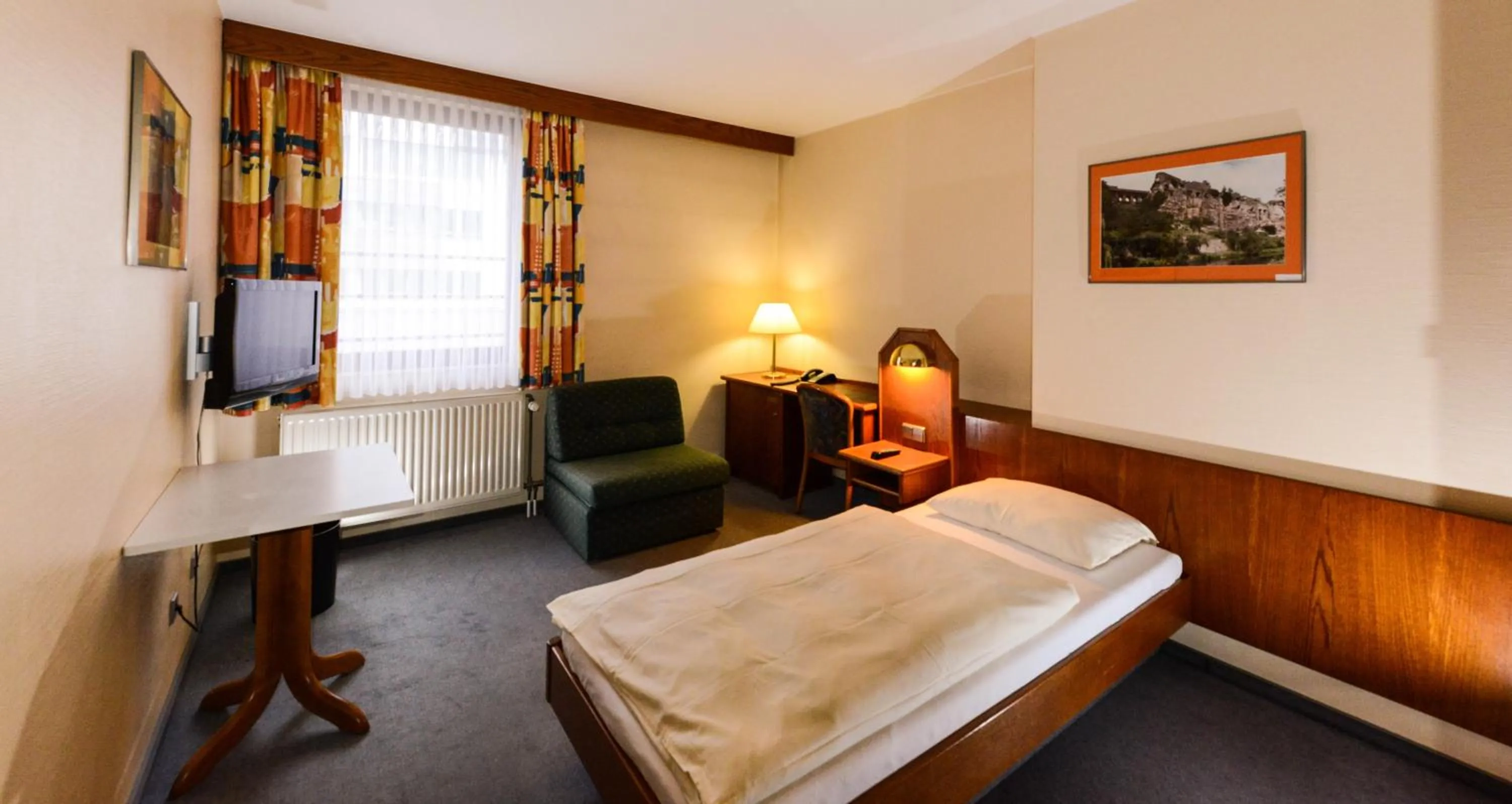 Bed in APPART-HÔTEL MARCO POLO