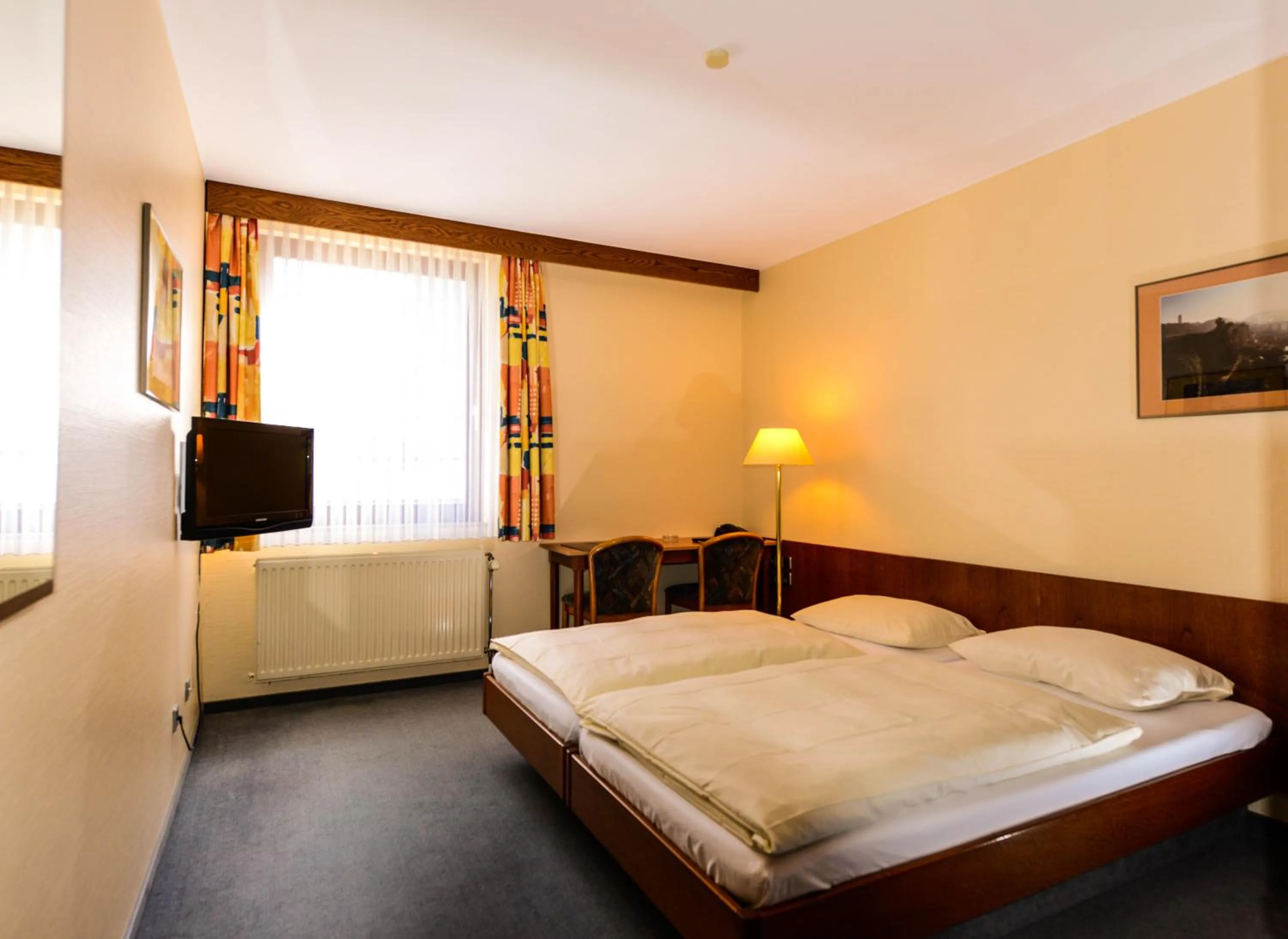 Bed in APPART-HÔTEL MARCO POLO