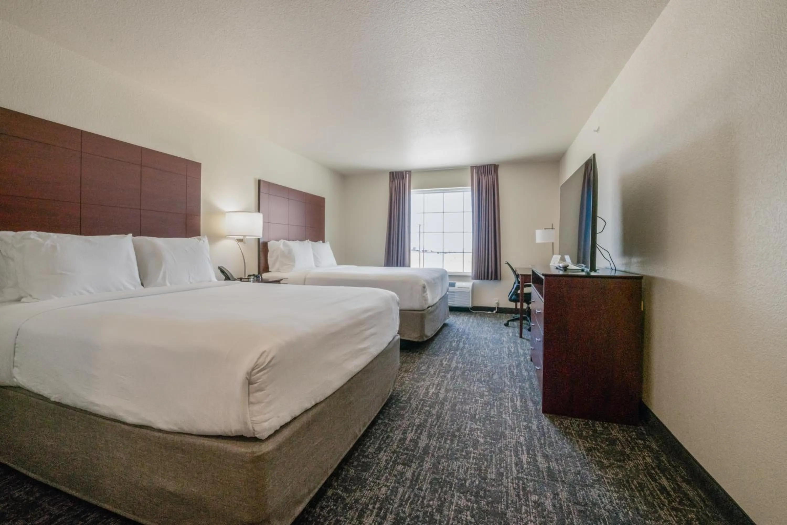 Bedroom, Bed in Cobblestone Inn & Suites - Boise City