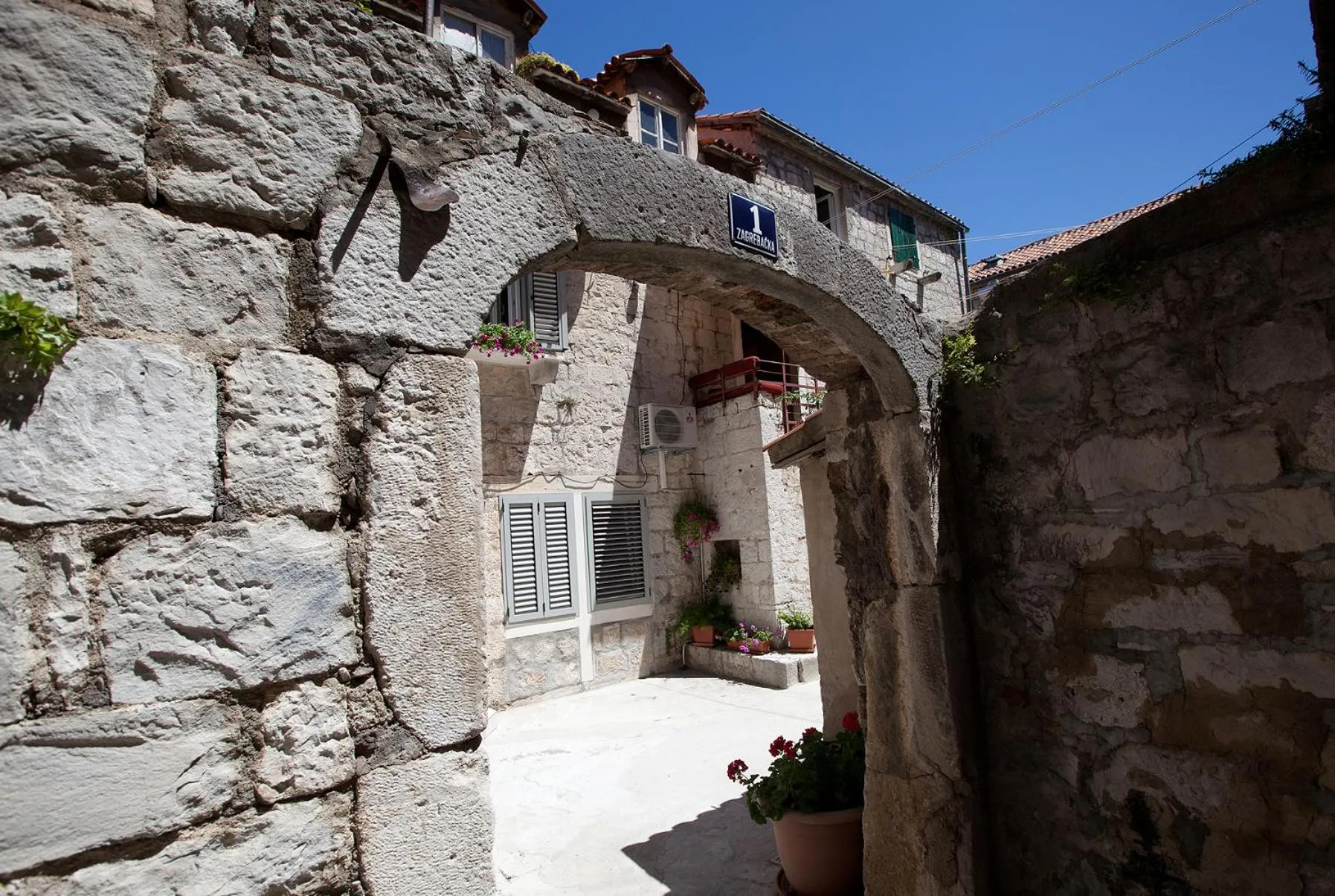 Property logo or sign in "Skalinada" Apartments in the Heart of Split