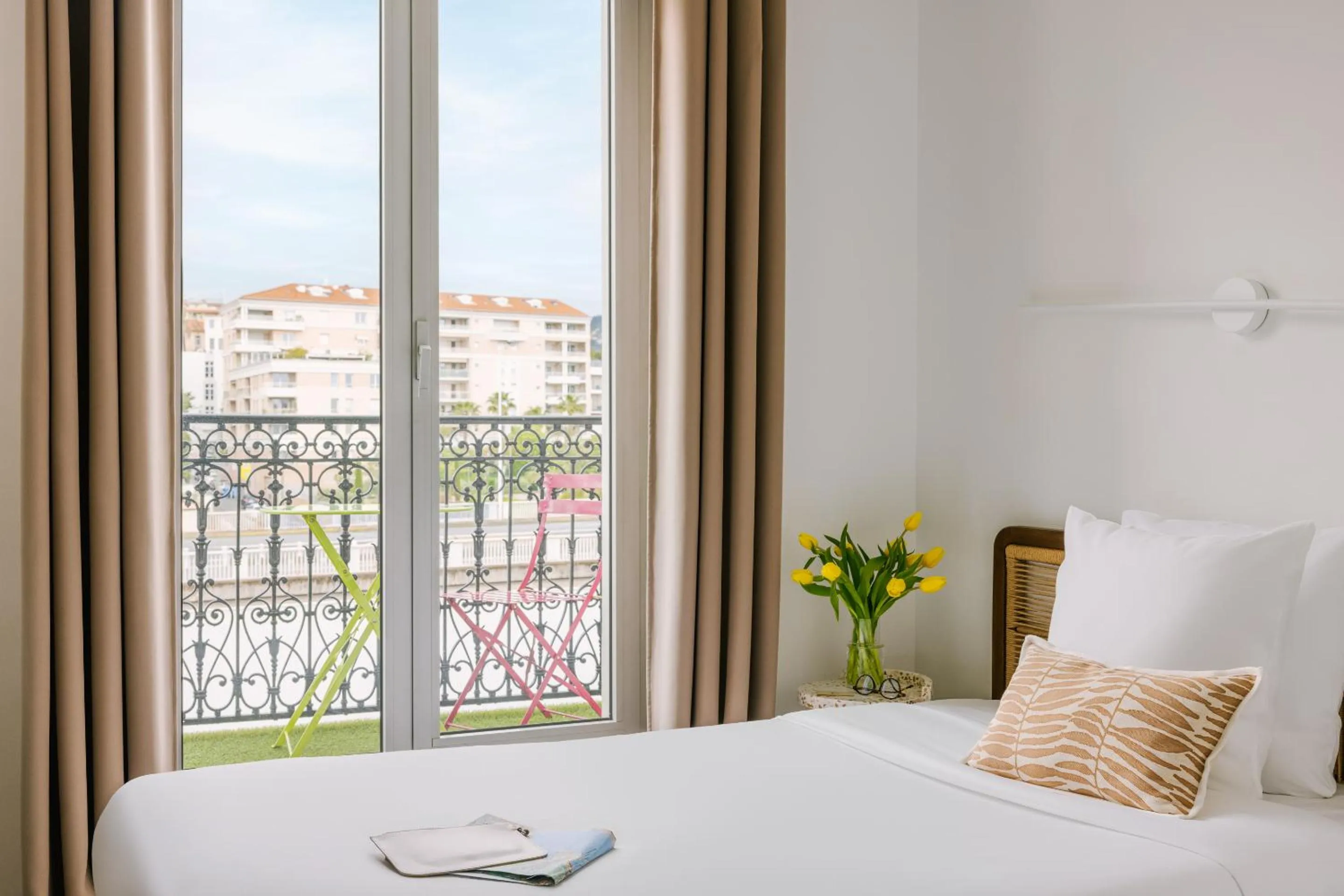 Bed in Yelo Lumière powered by Sonder