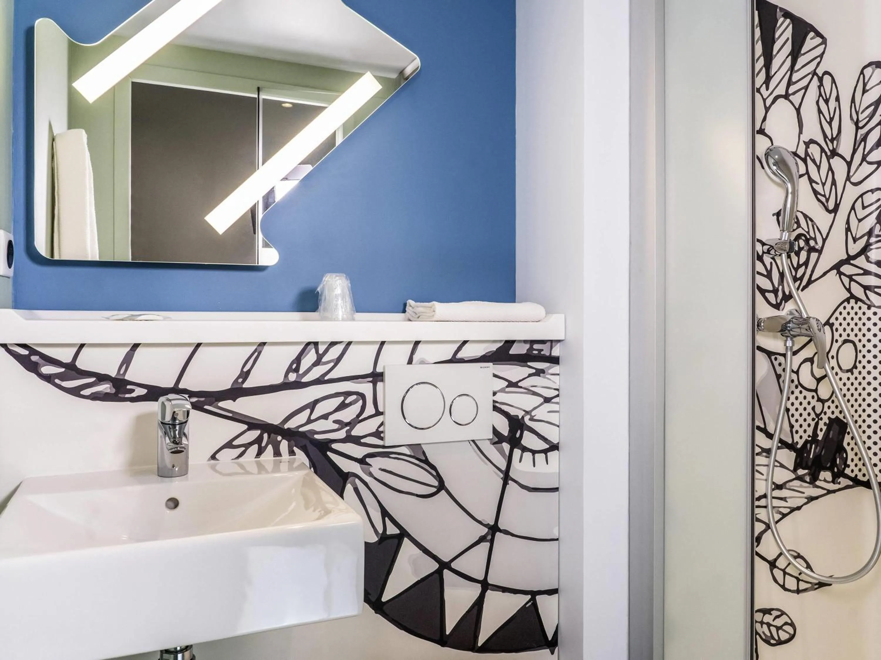 Bedroom in Ibis Budget Aubenas