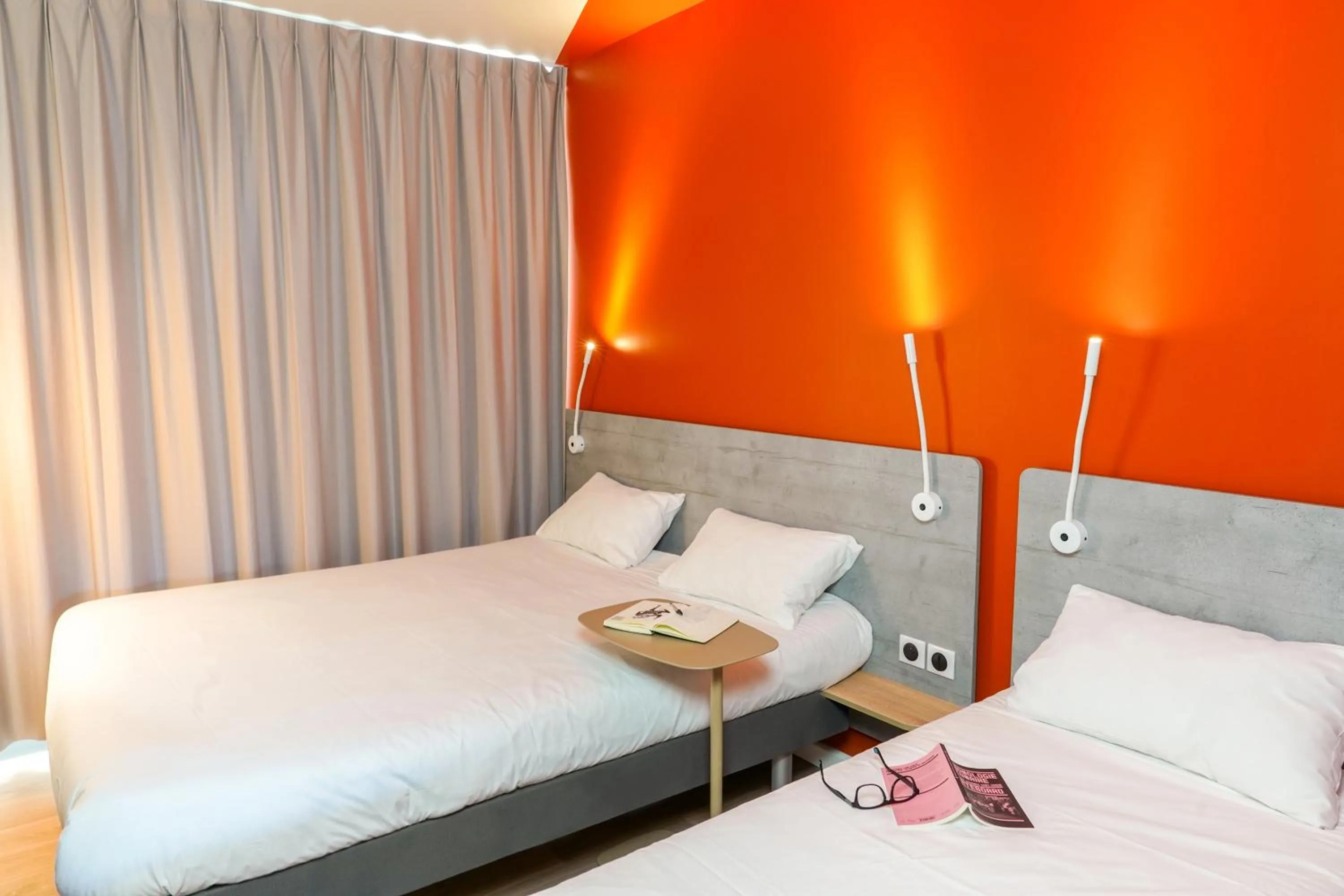 Bed in Ibis Budget Aubenas