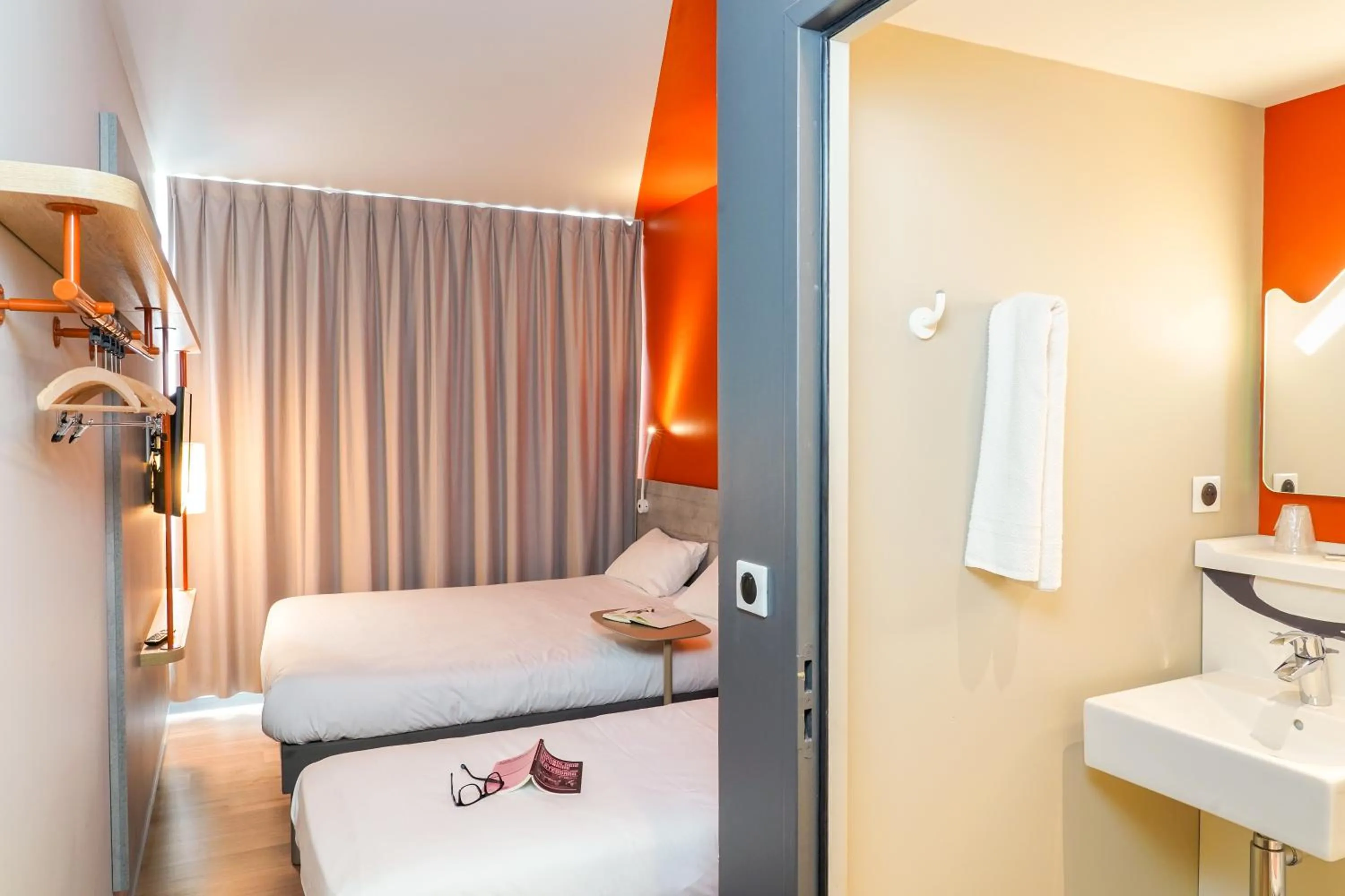 Bed in Ibis Budget Aubenas