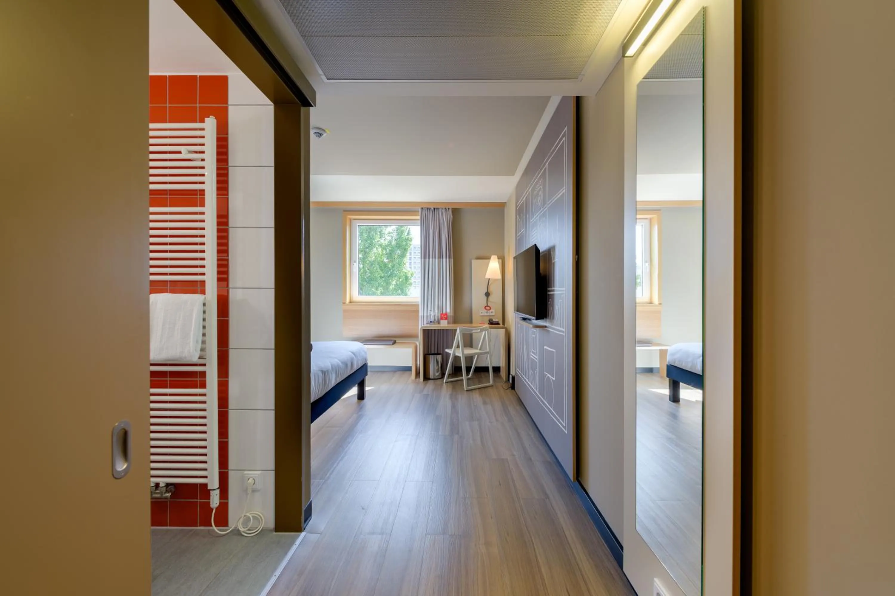 Bedroom in Ibis München City Arnulfpark